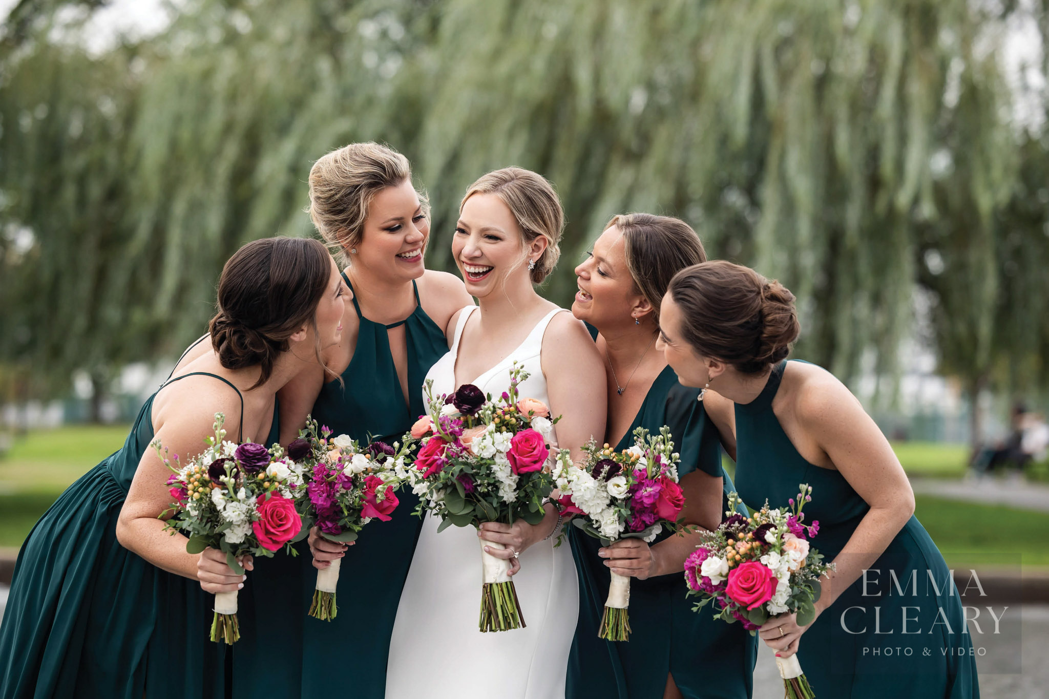Laughing bridesmaids and the bride