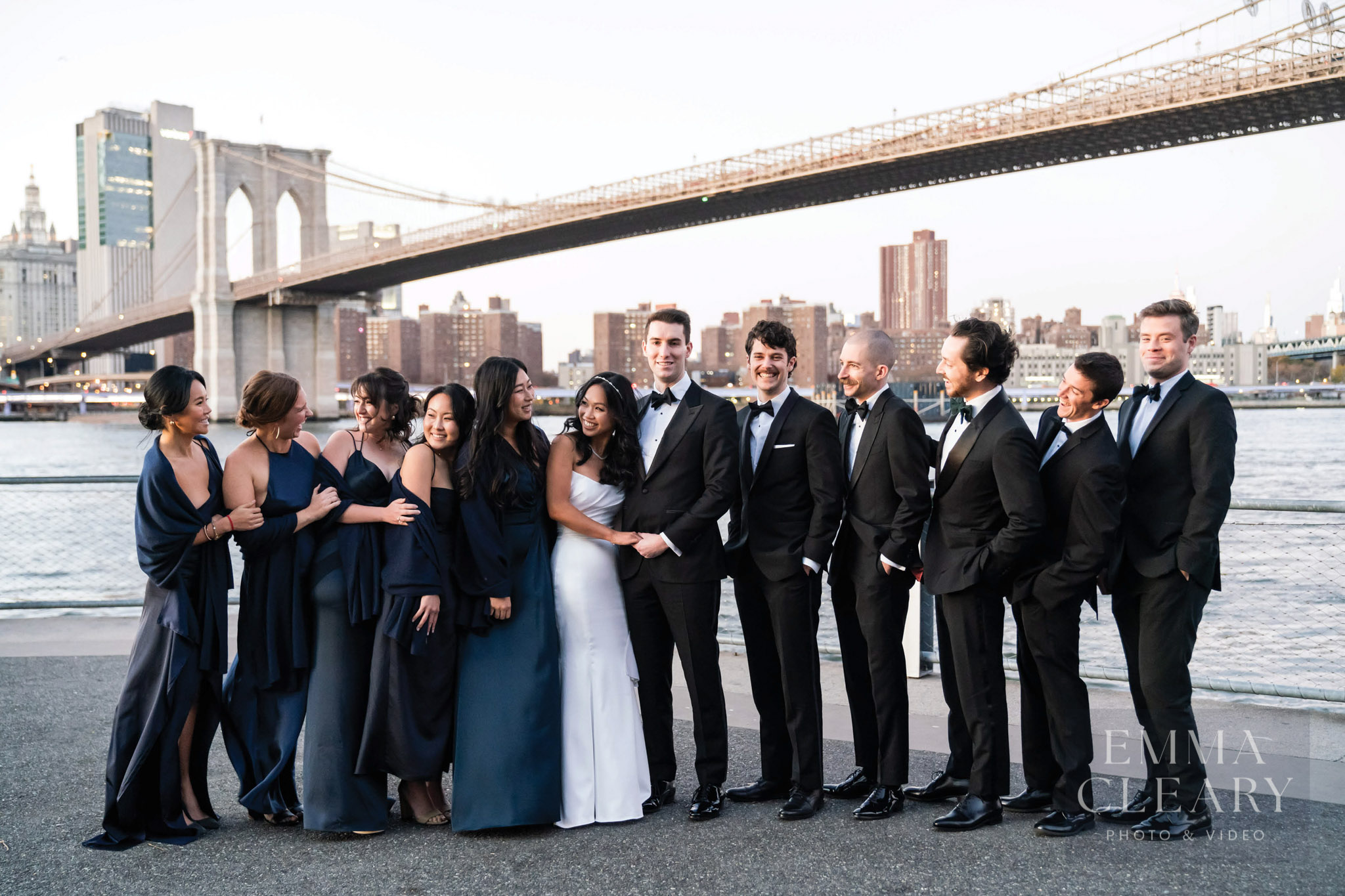 Bridesmaids and groomsmen photo with Brooklyn Bridge view