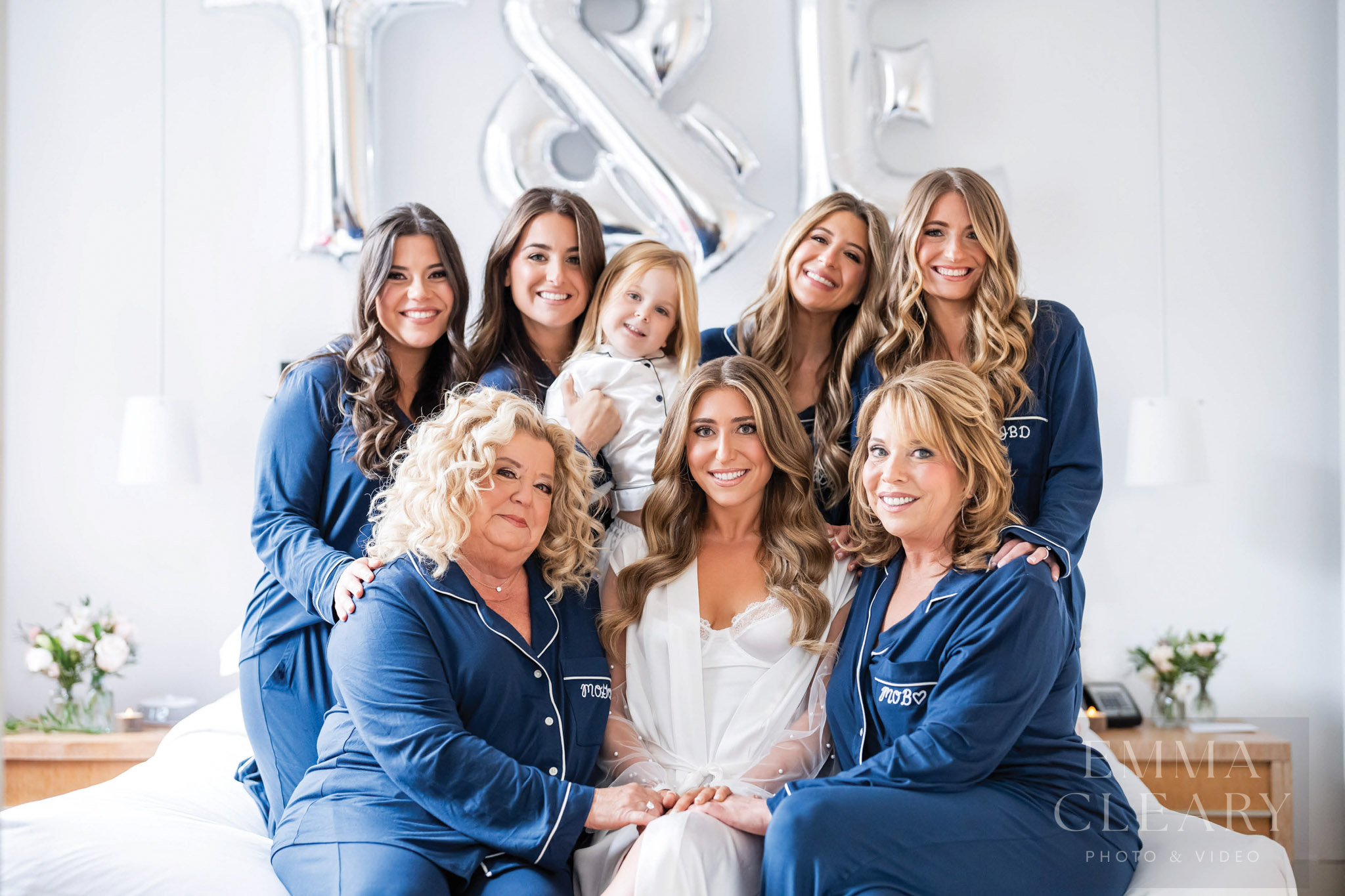 Bride and bridesmaids and mom