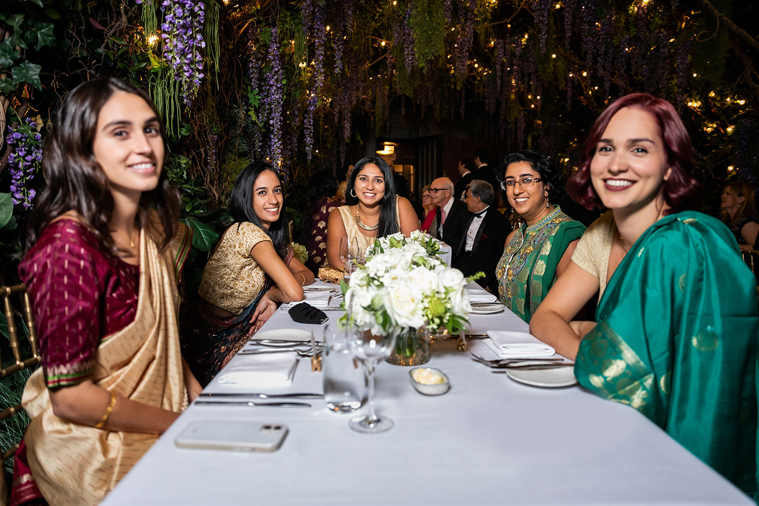 wedding guests at long table