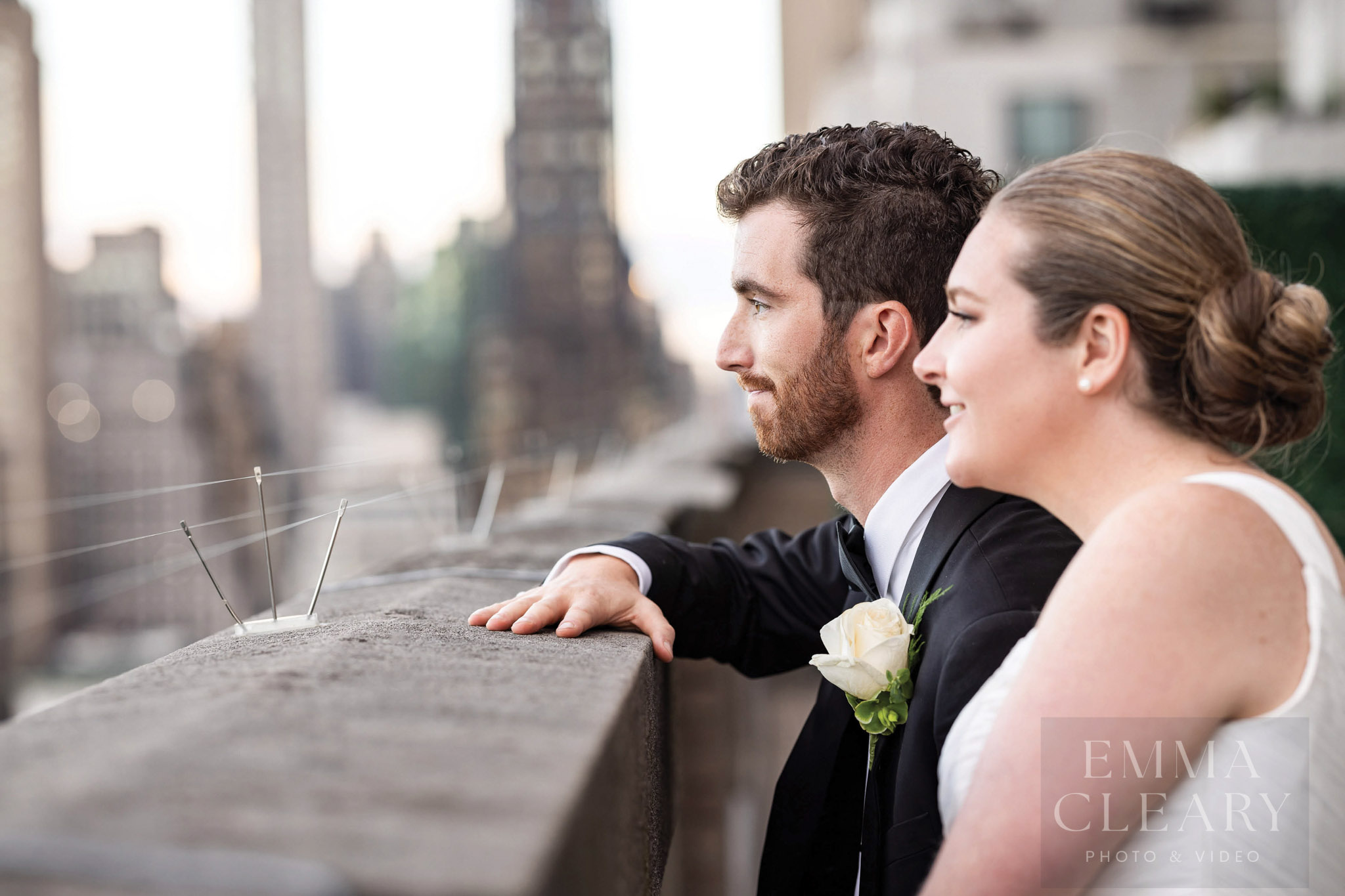 The bride and groom admire the view