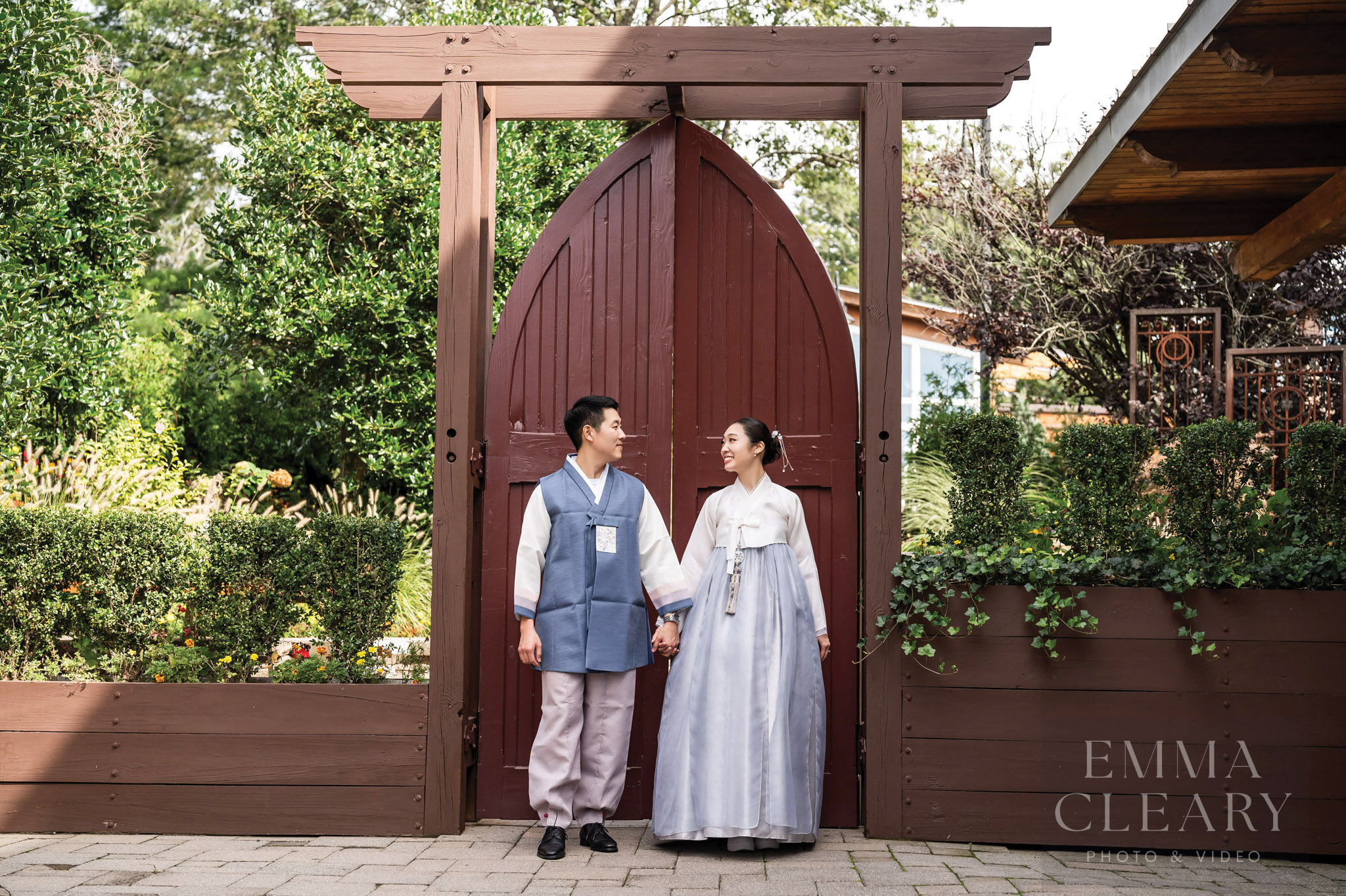 The bride and groom in traditional costumes