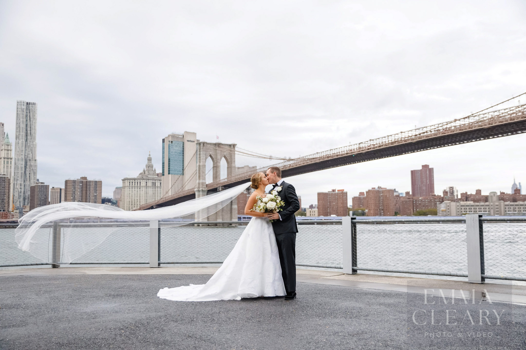 Wedding kiss with a view of the city