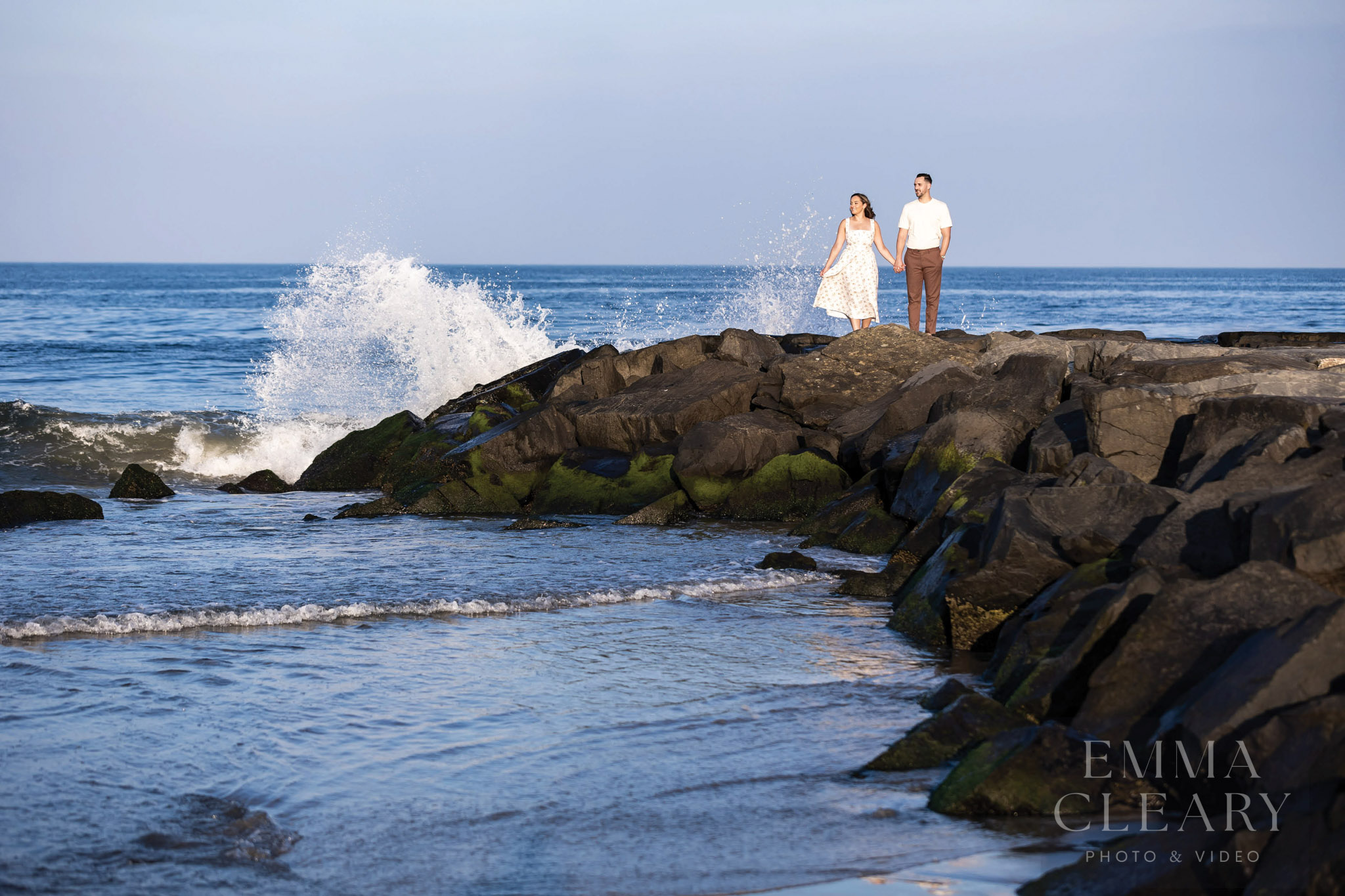 Portrait of a couple against the background of waves