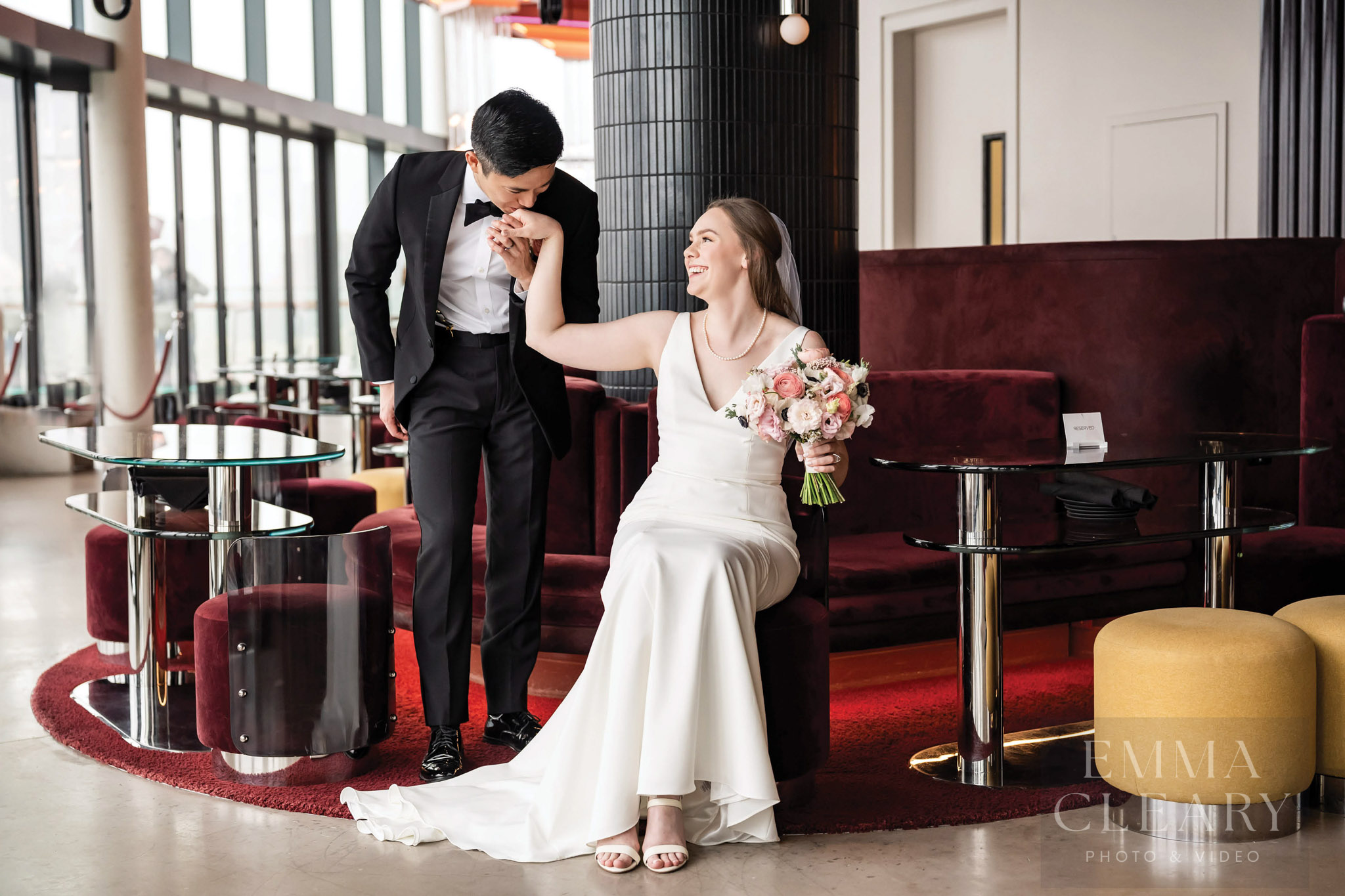 The groom kisses the bride