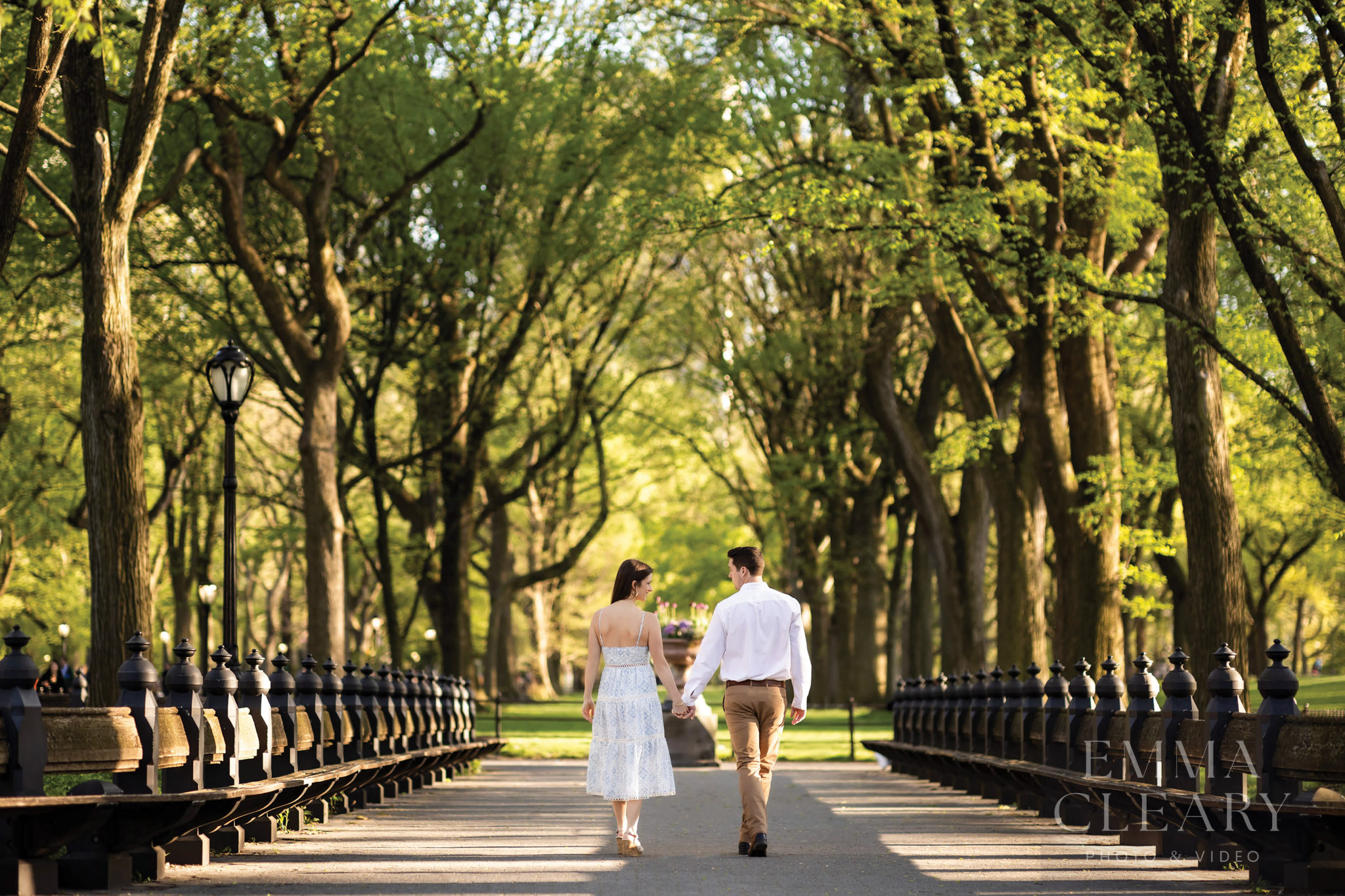 A couple walks in the park