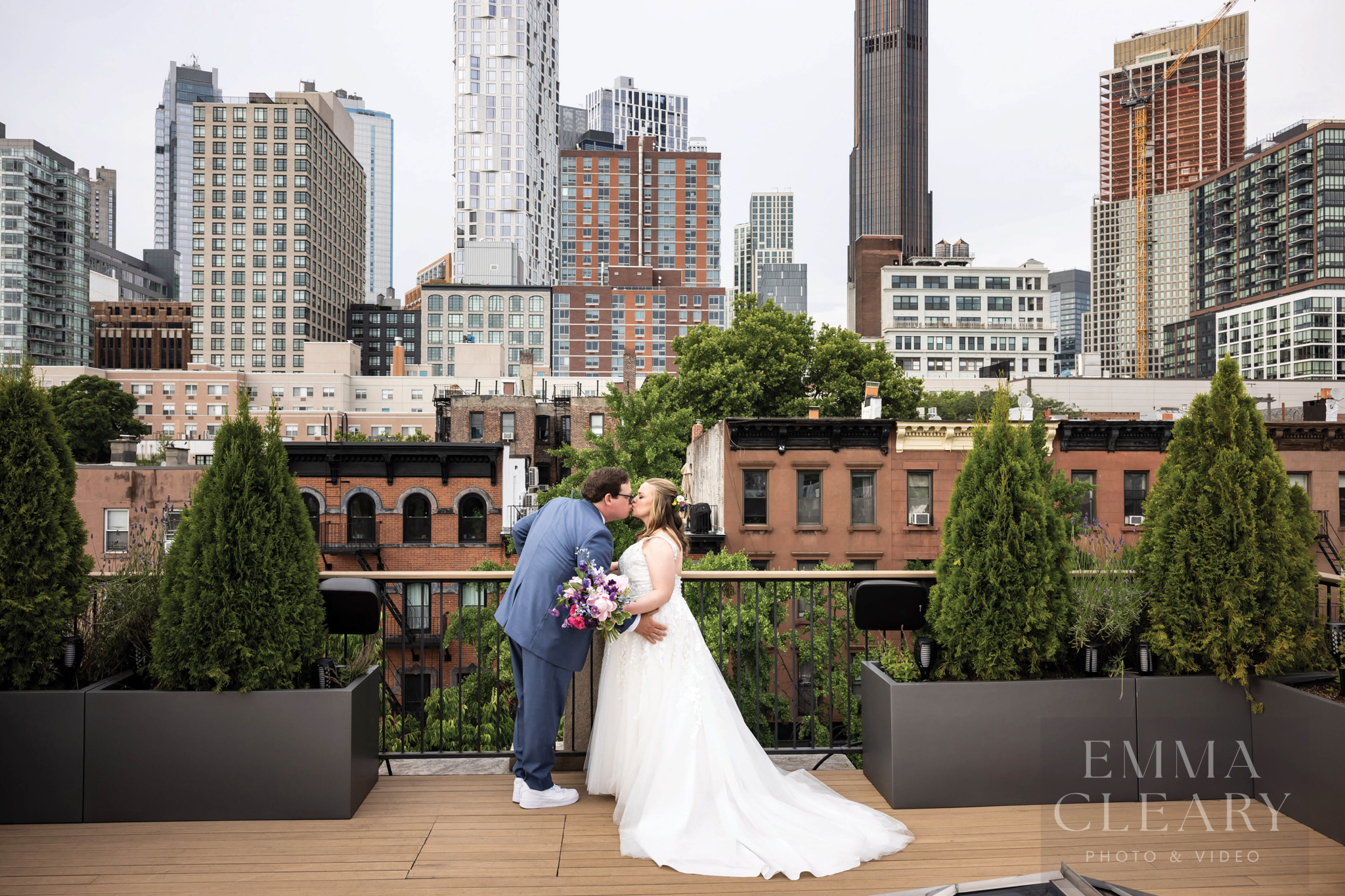 Wedding kiss with a view of the city