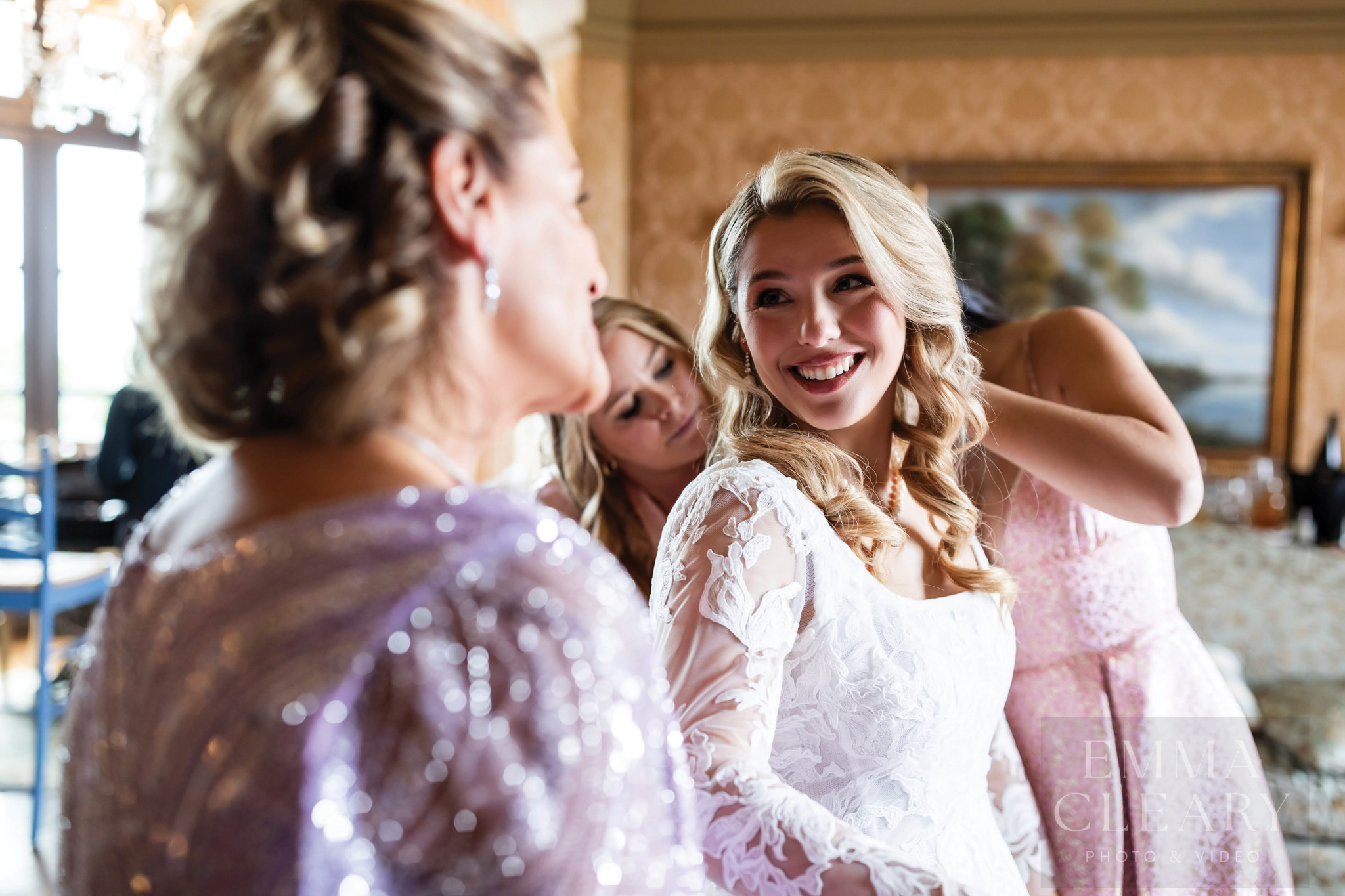 Bride and bridesmaids and mom