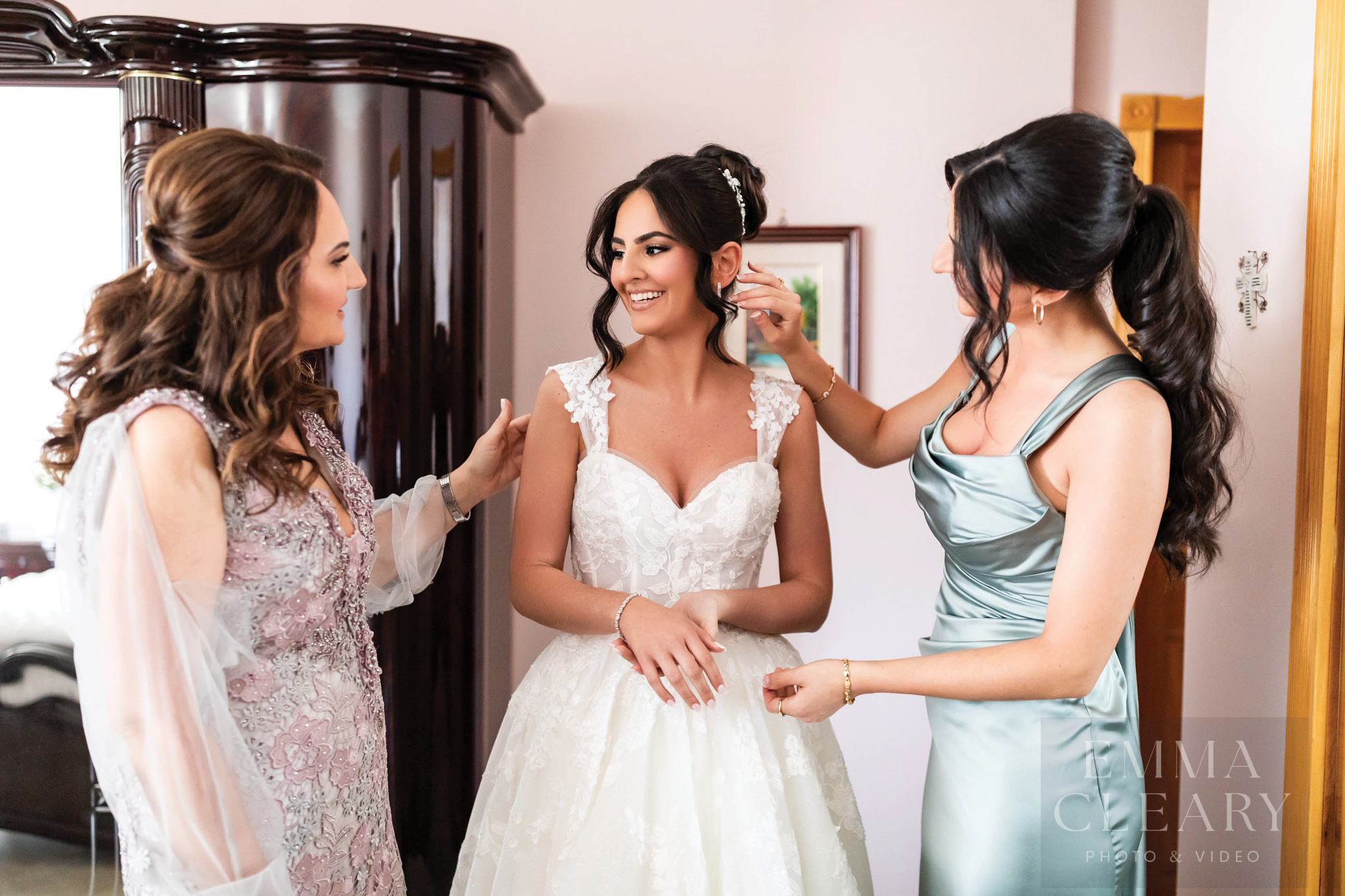 Bride and bridesmaid and mom