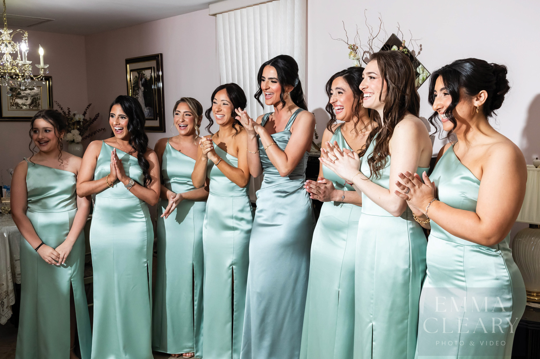 Bridesmades are surprised by the bride