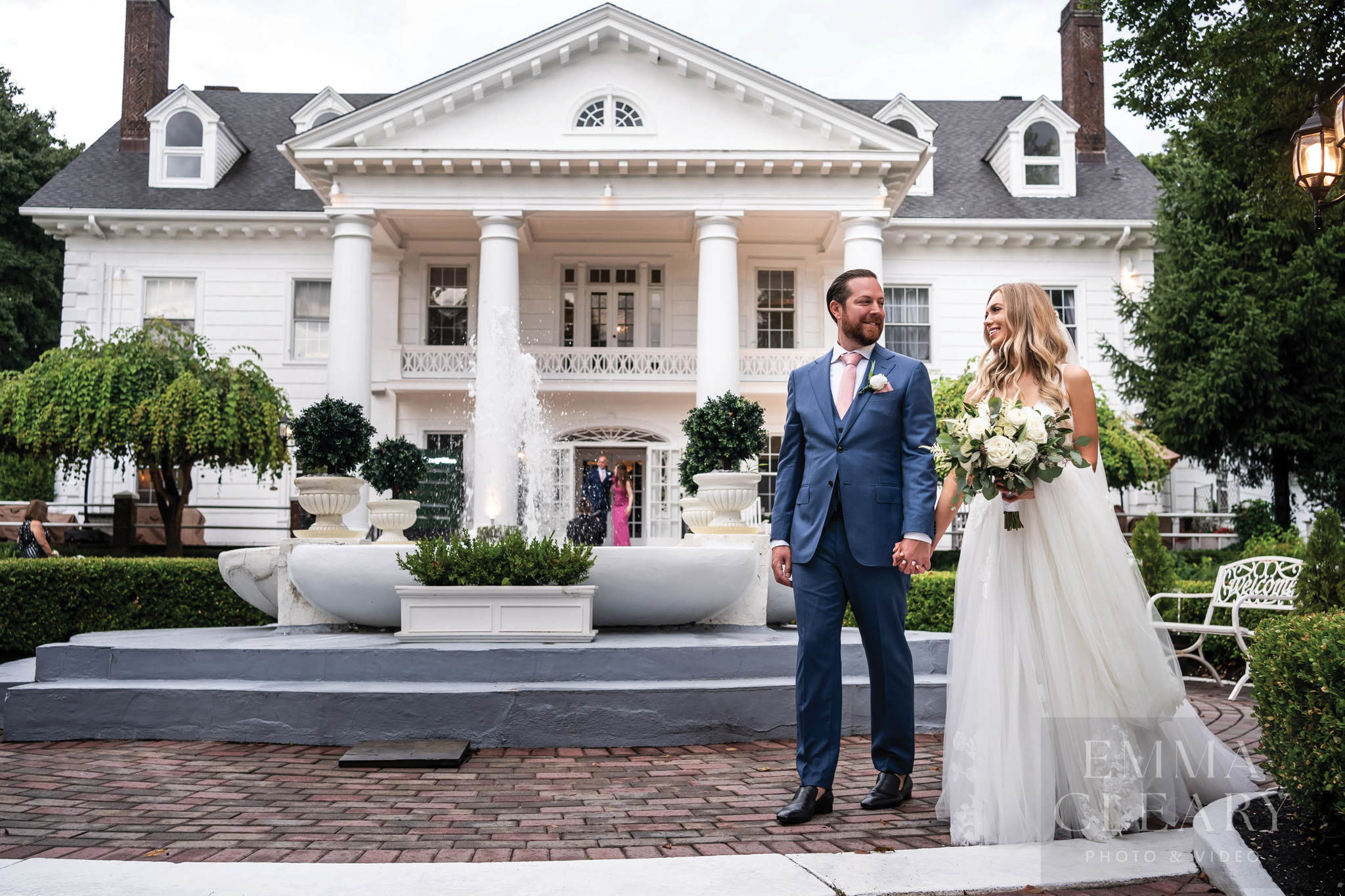 The bride and groom are walking