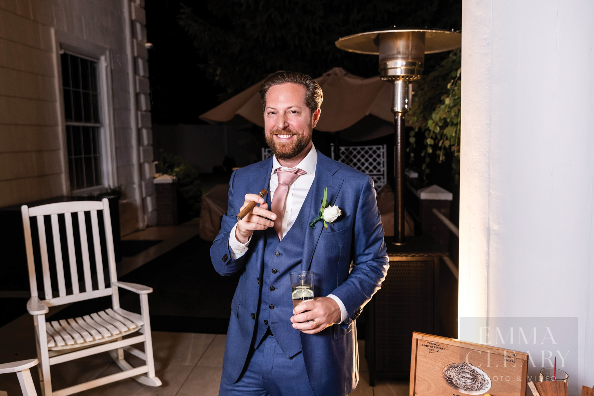 Groom smoking cigar