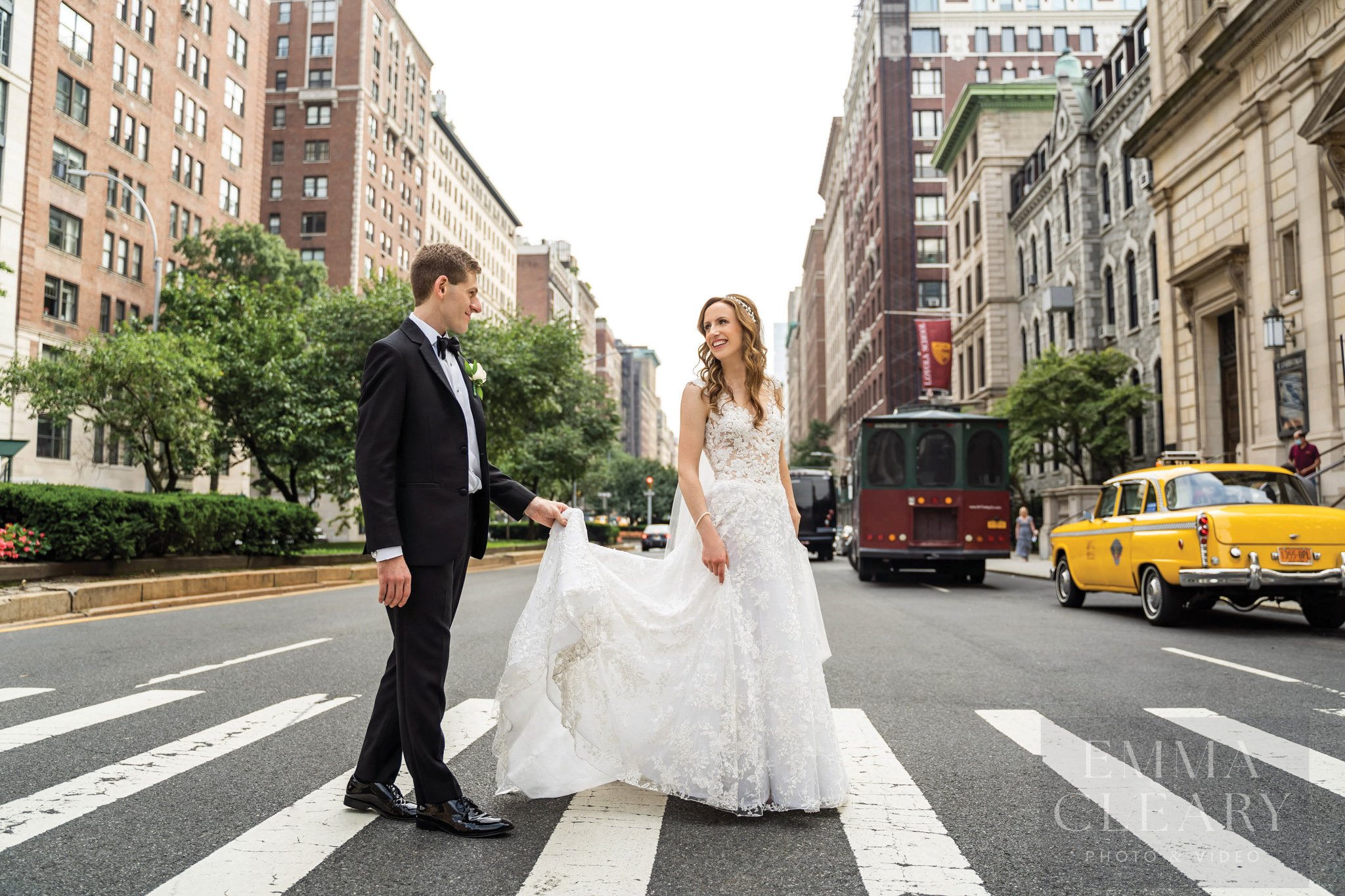 The bride and groom are walking