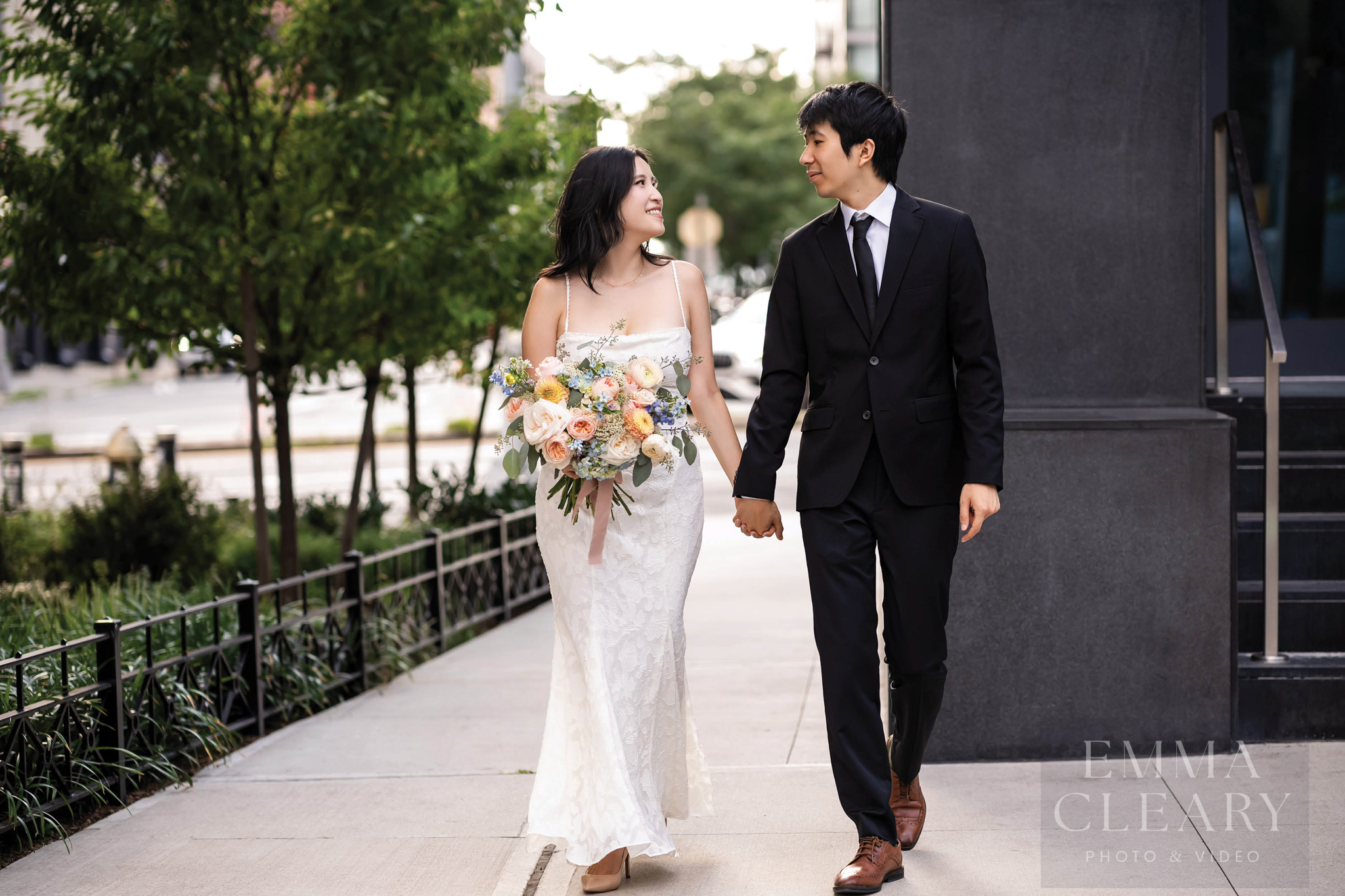 The bride and groom are walking