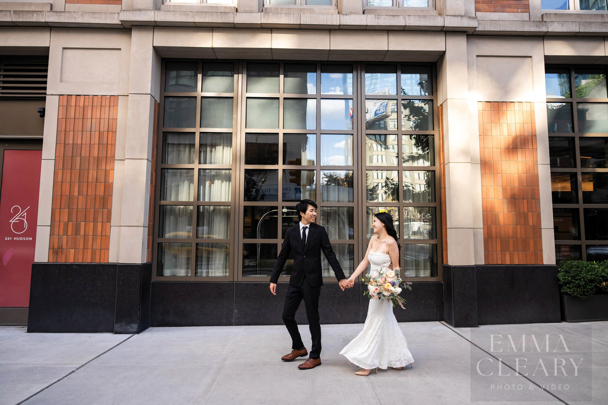 The bride and groom are walking