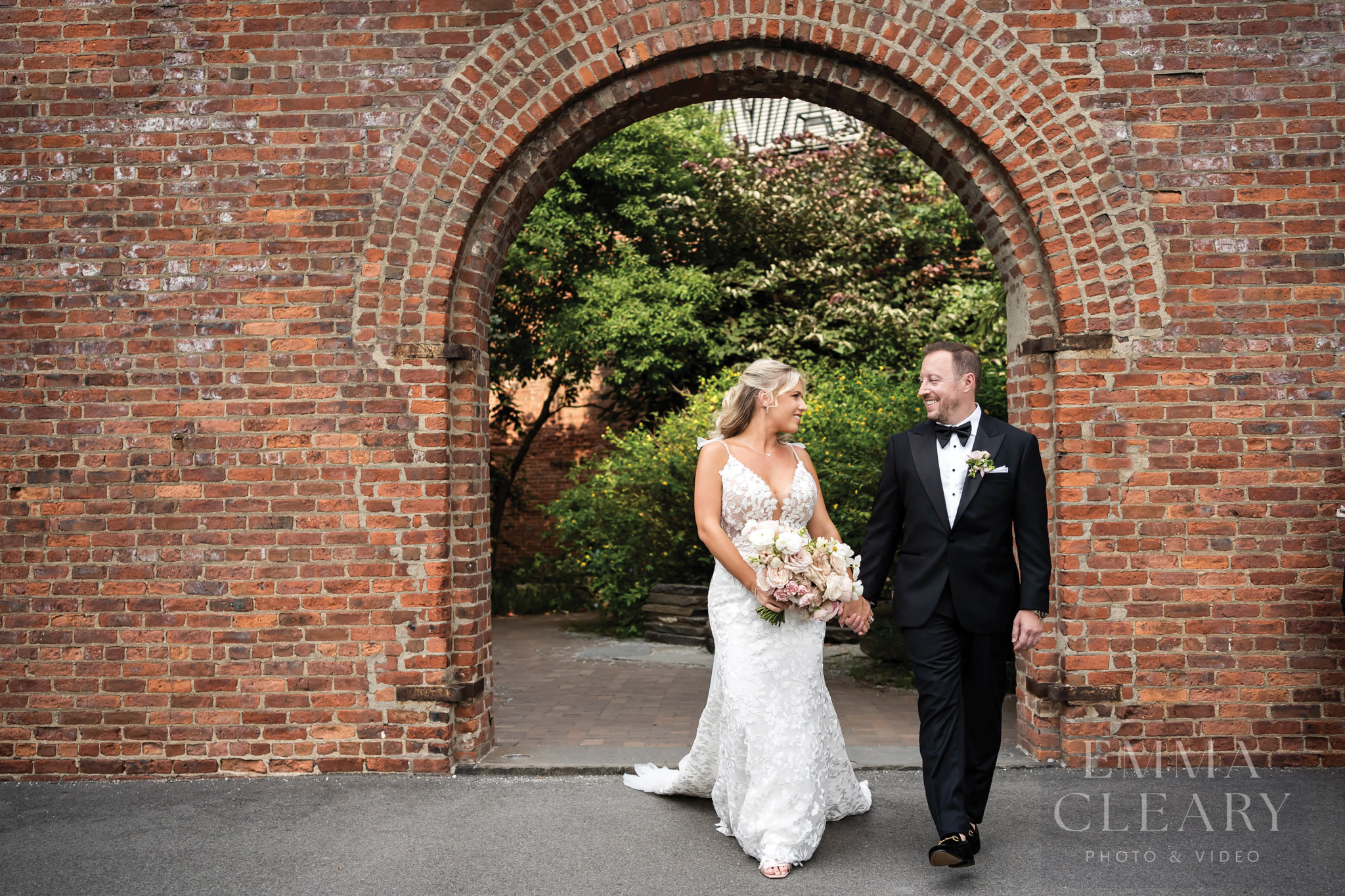 The bride and groom are walking