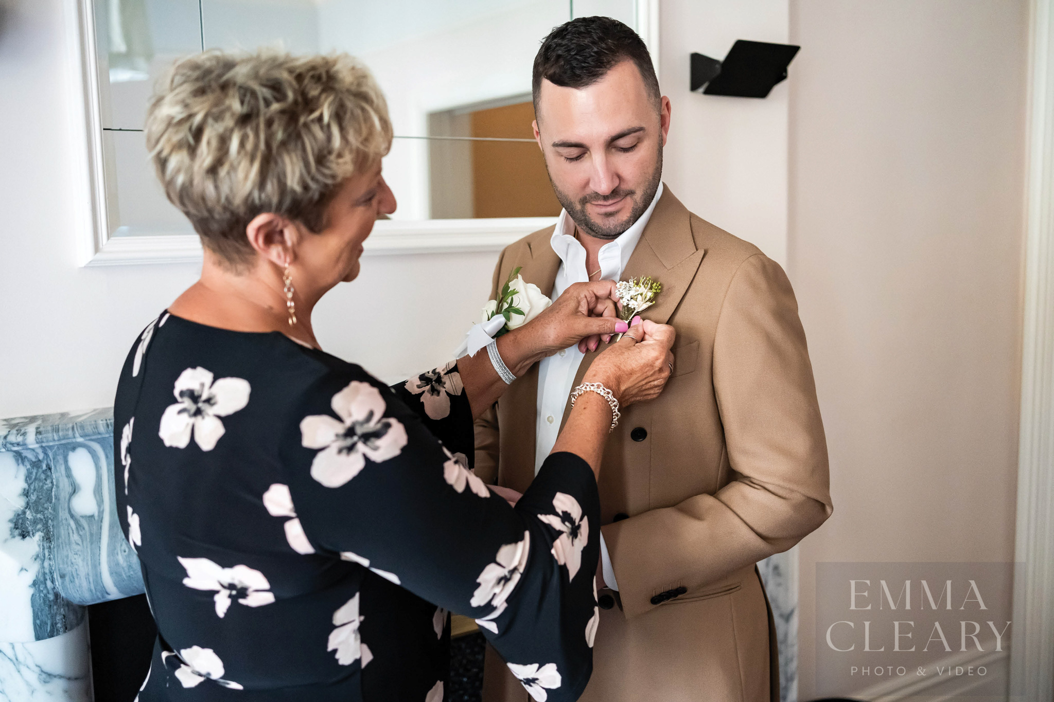 Mom helps the groom