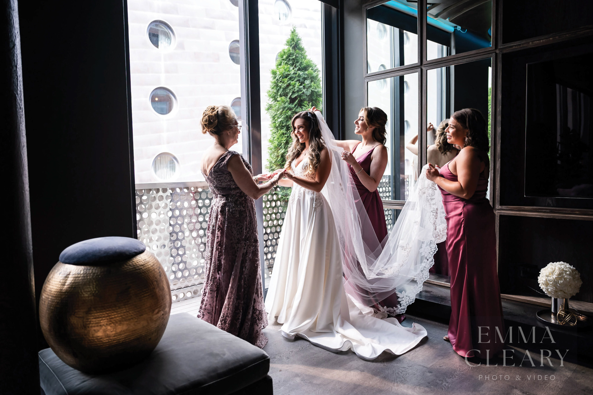 Bride and bridesmaids and mom