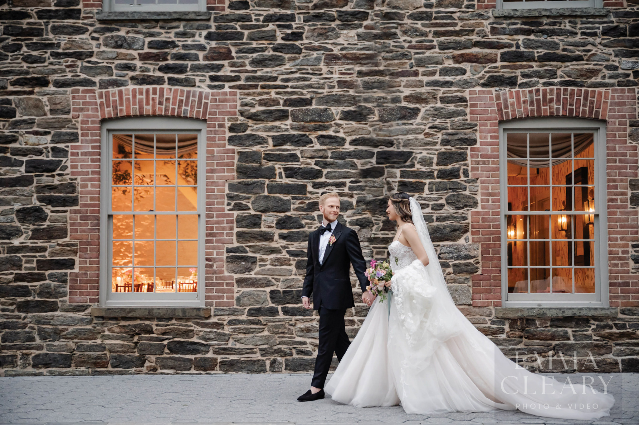 The bride and groom are walking