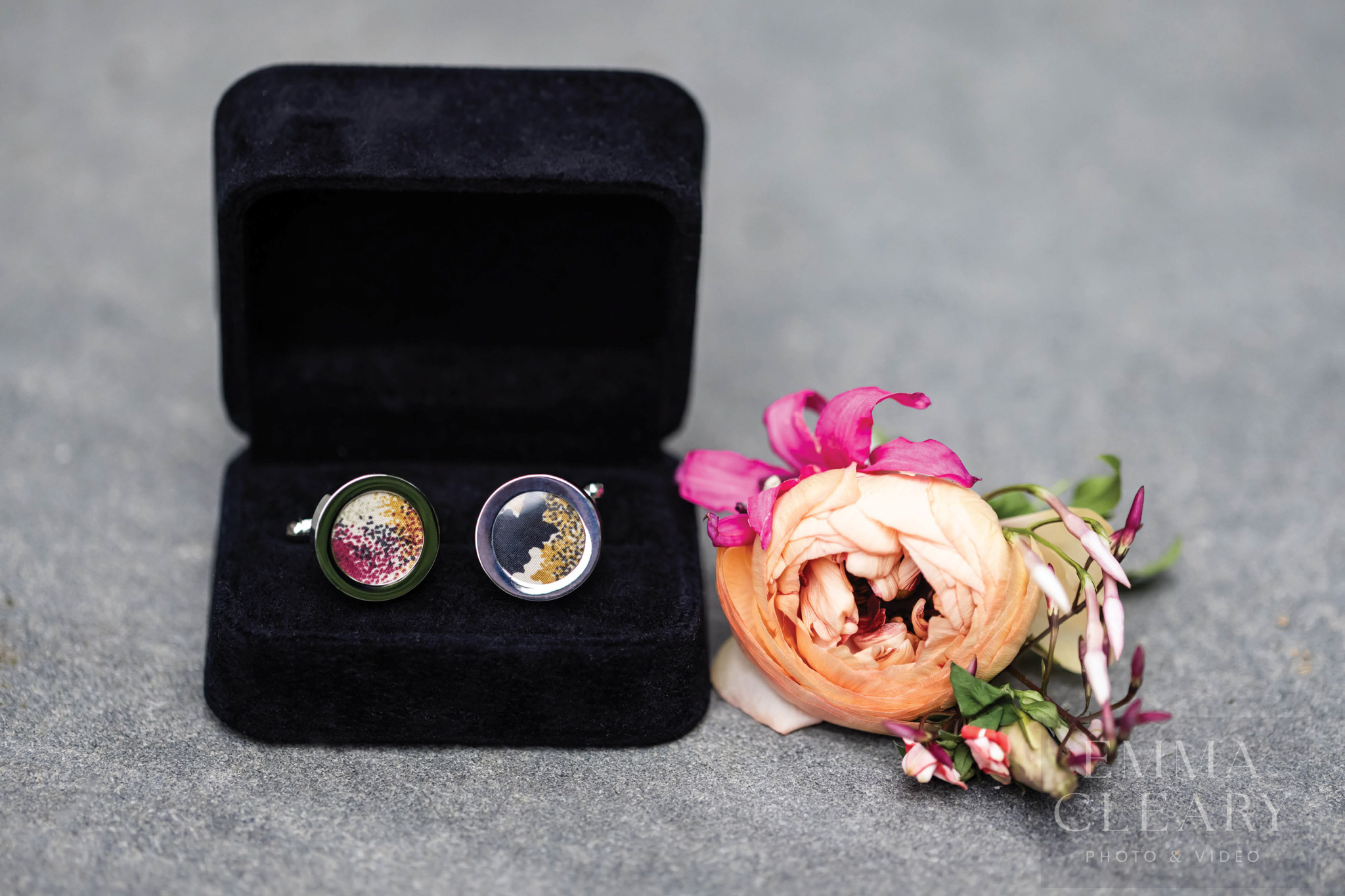 The groom's wedding boutonniere and cufflinks