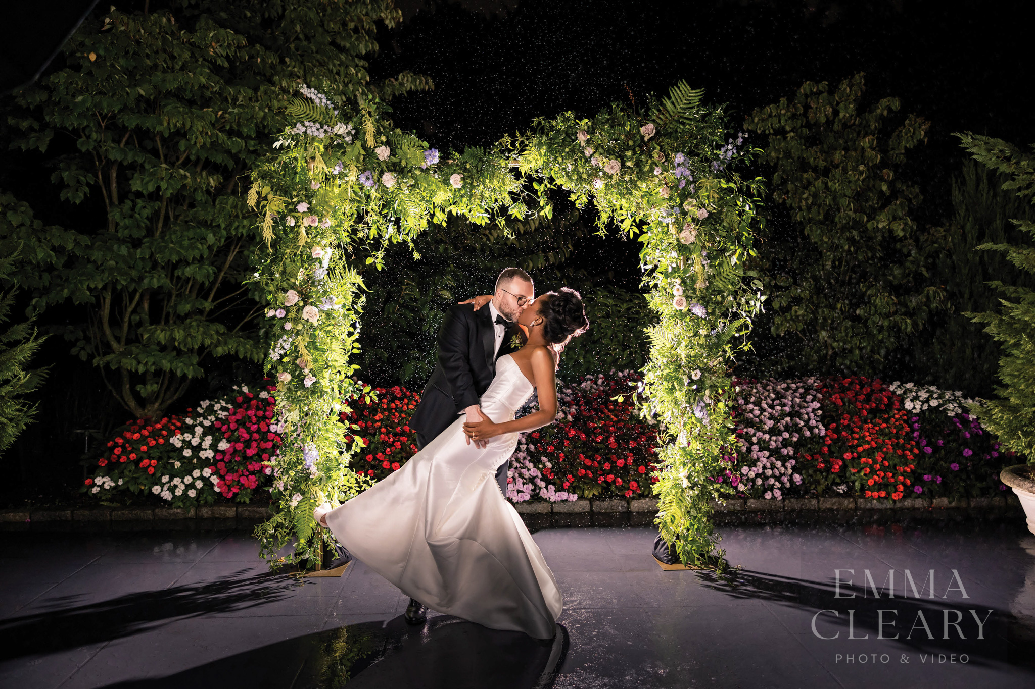 Wedding kiss in the rain
