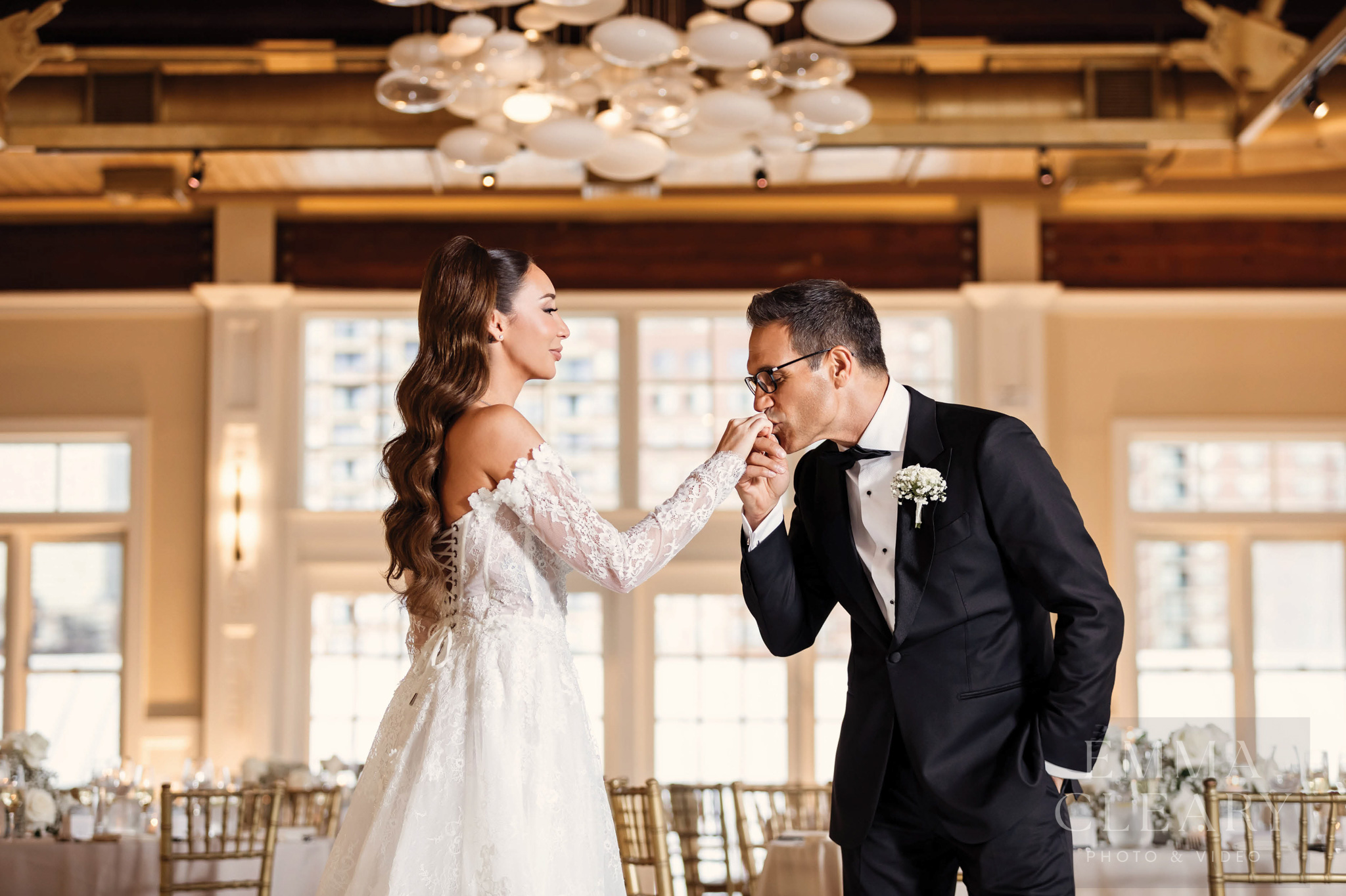 Liberty House The groom kisses the bride's hand