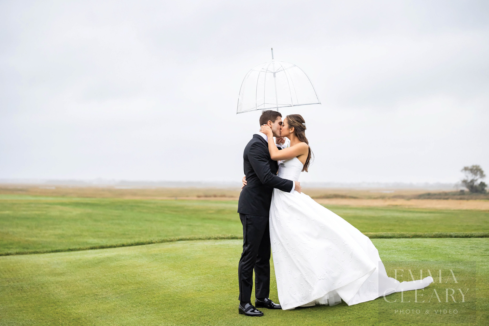 Wedding kiss in the rain