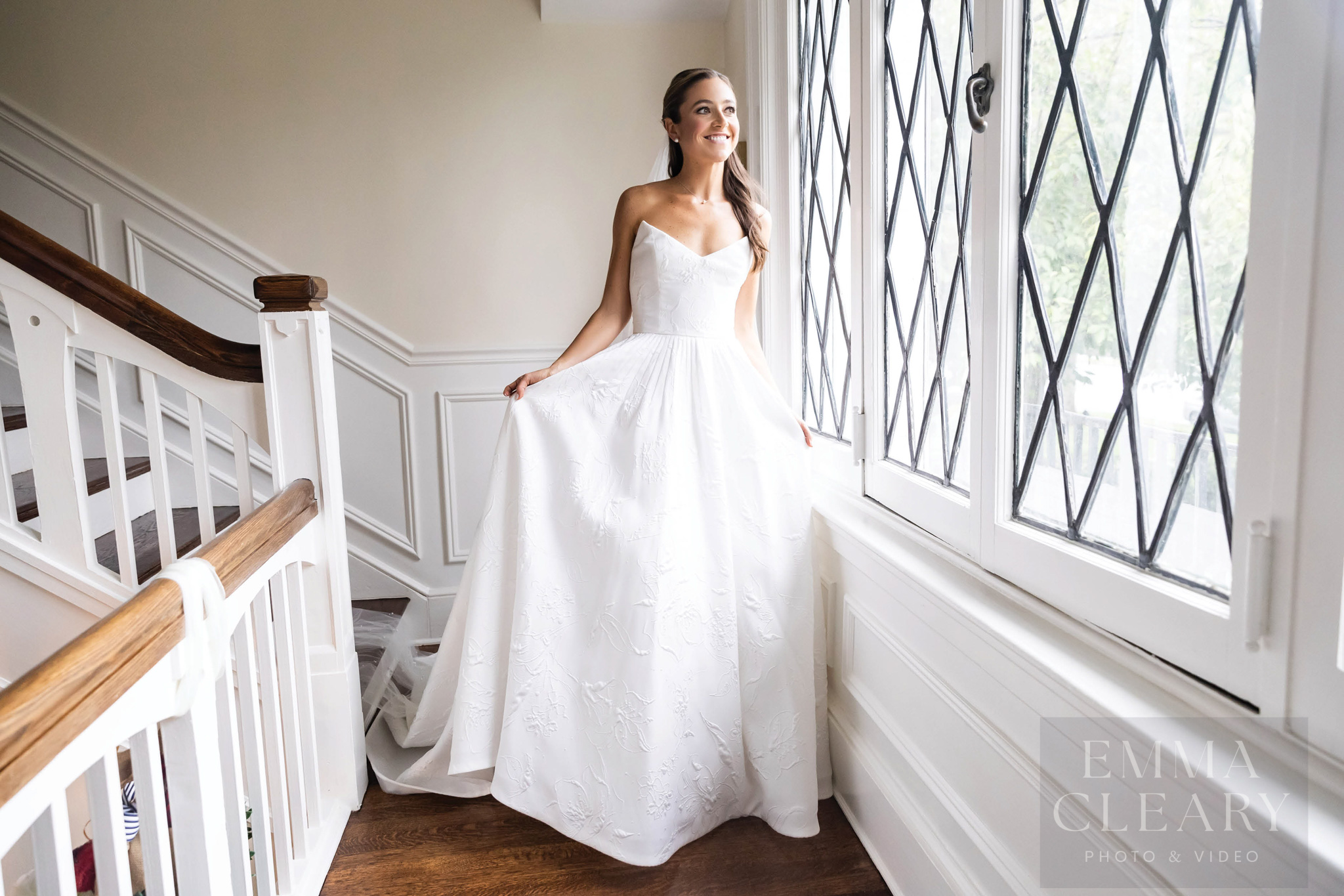 Photo of the bride at the window