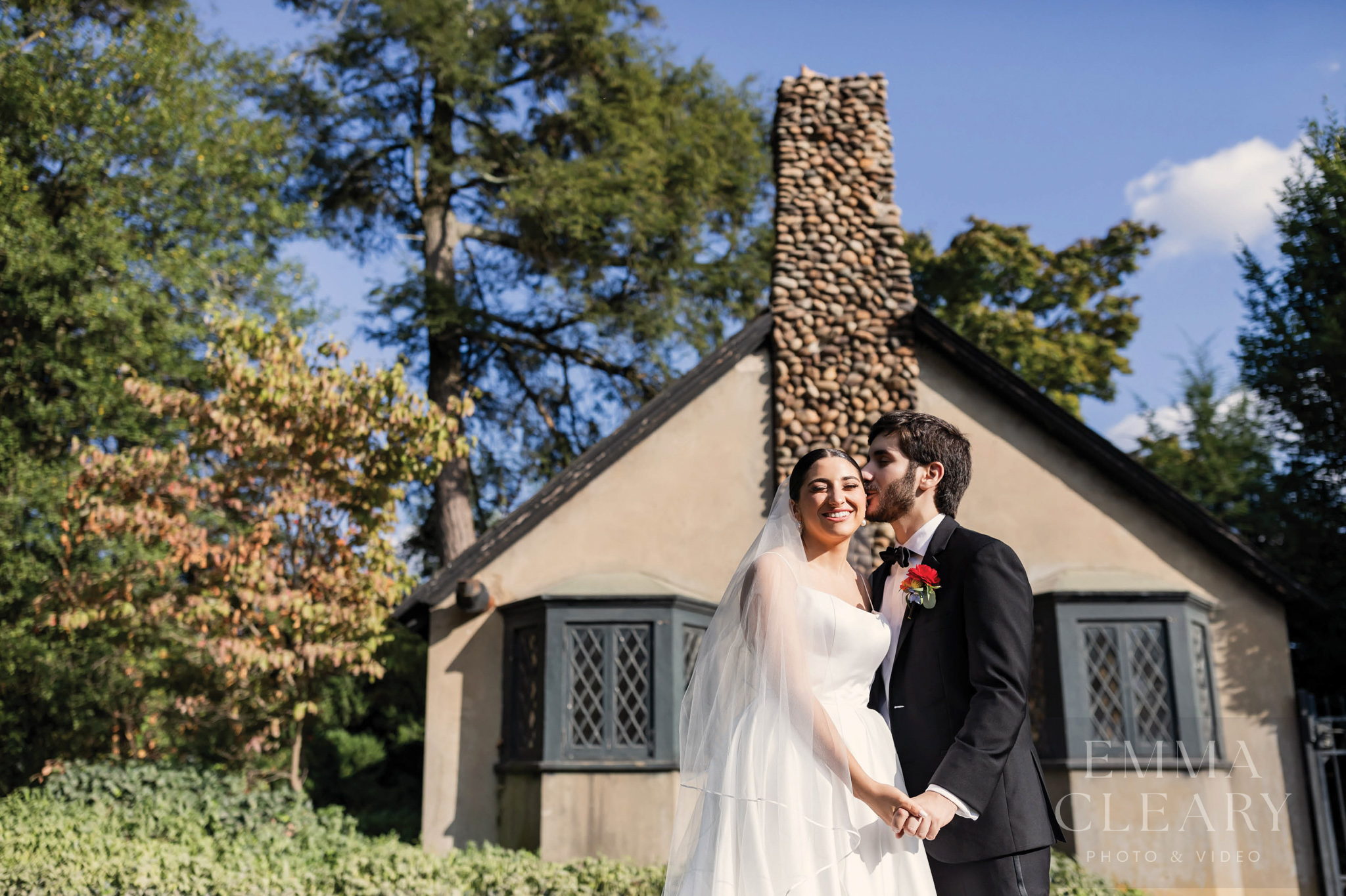 The groom kisses the bride