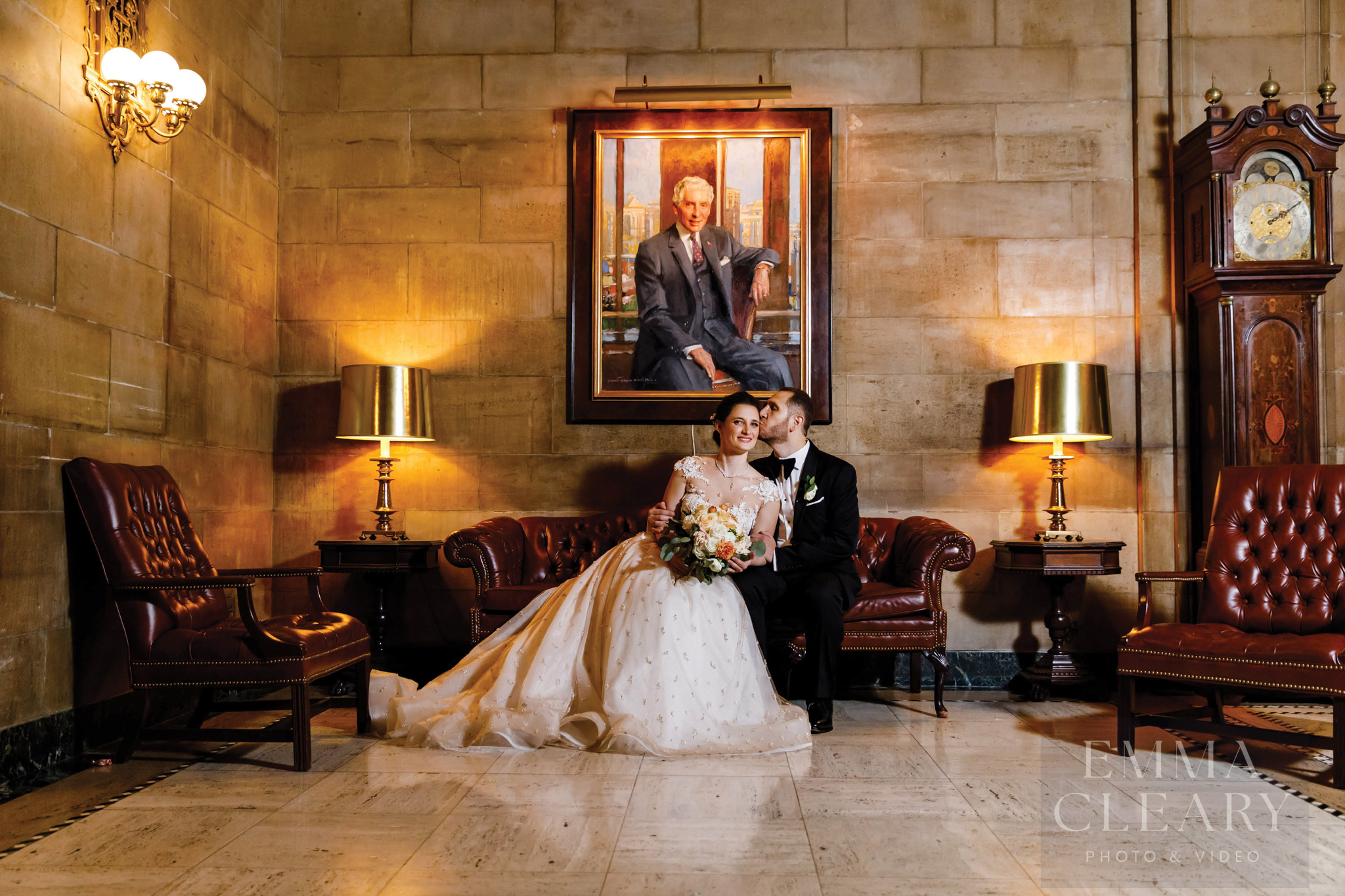 The groom kisses the bride