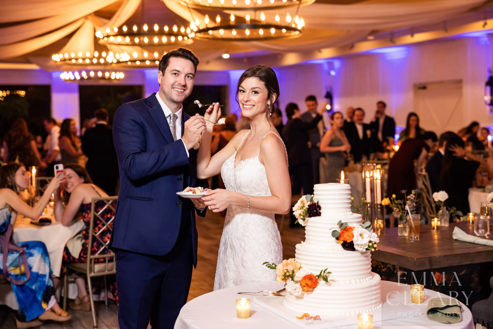 The Farmhouse Cutting a wedding cake