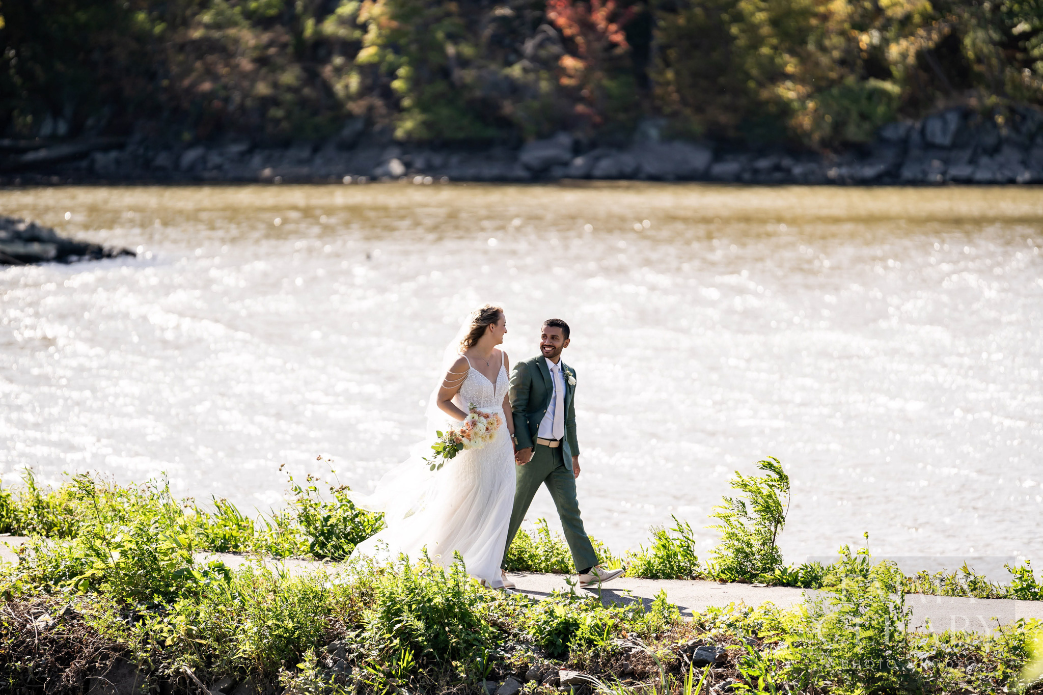 The bride and groom are walking