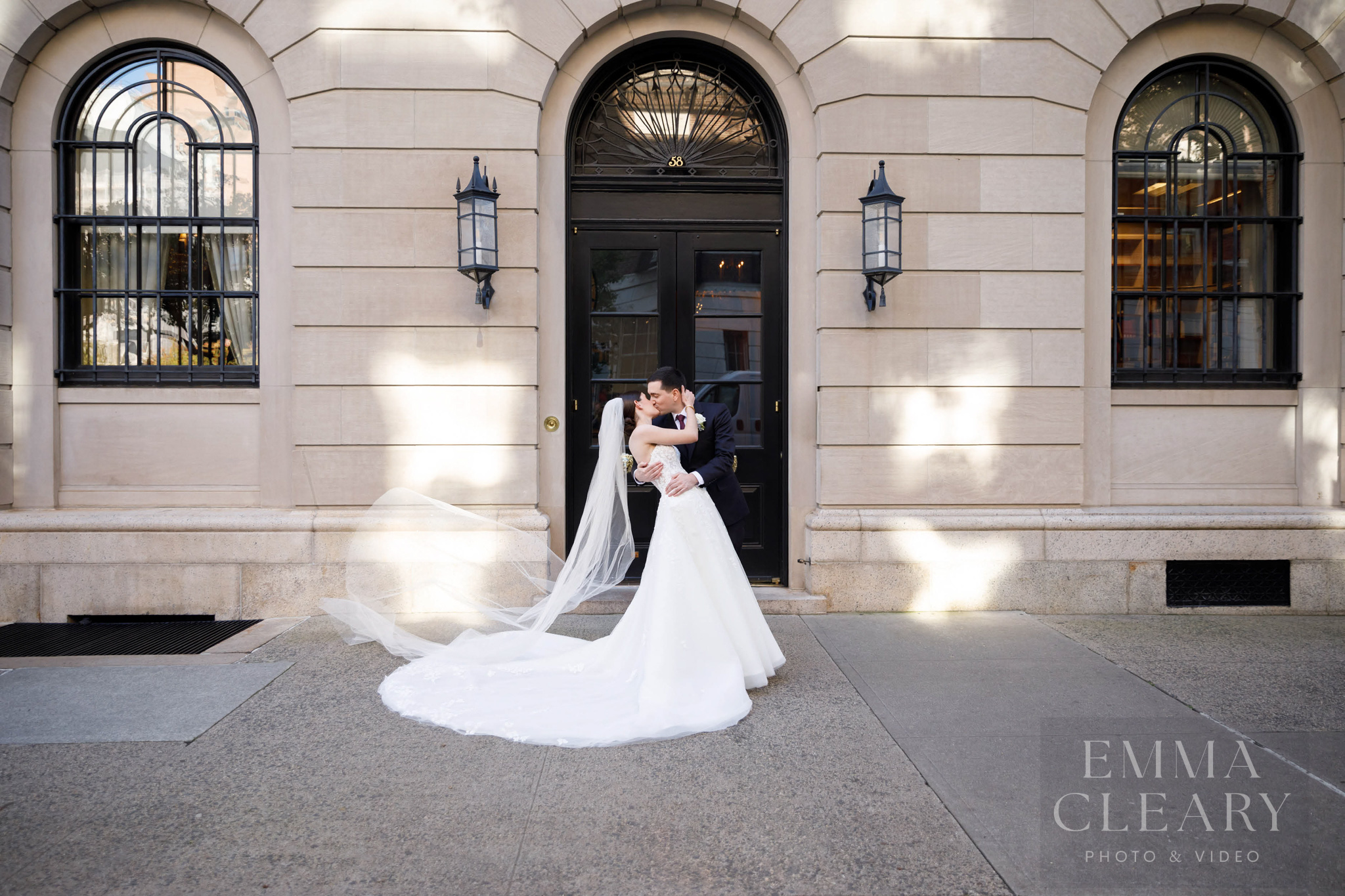 Wedding photo of a couple kissing
