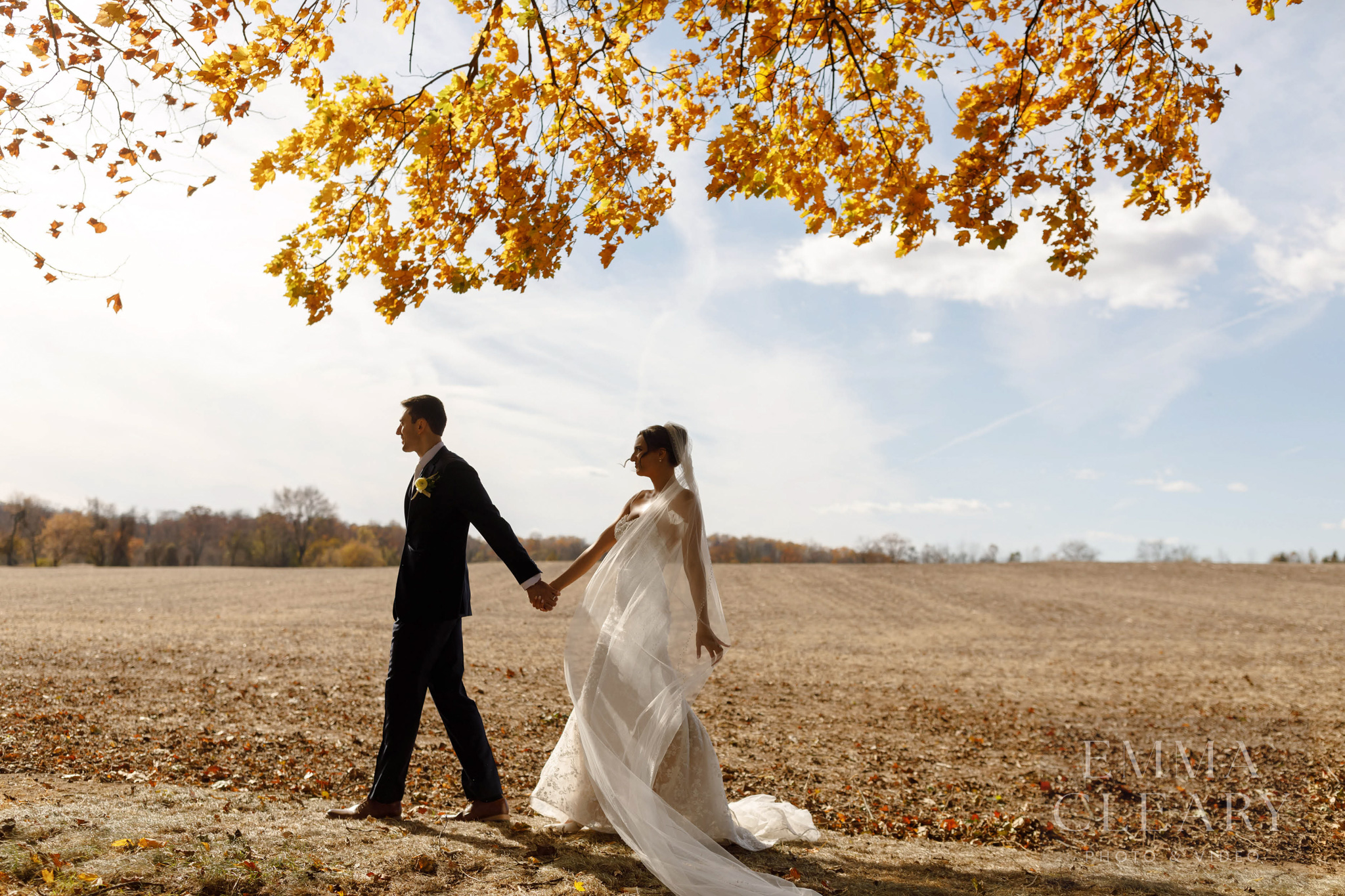 The bride and groom are walking