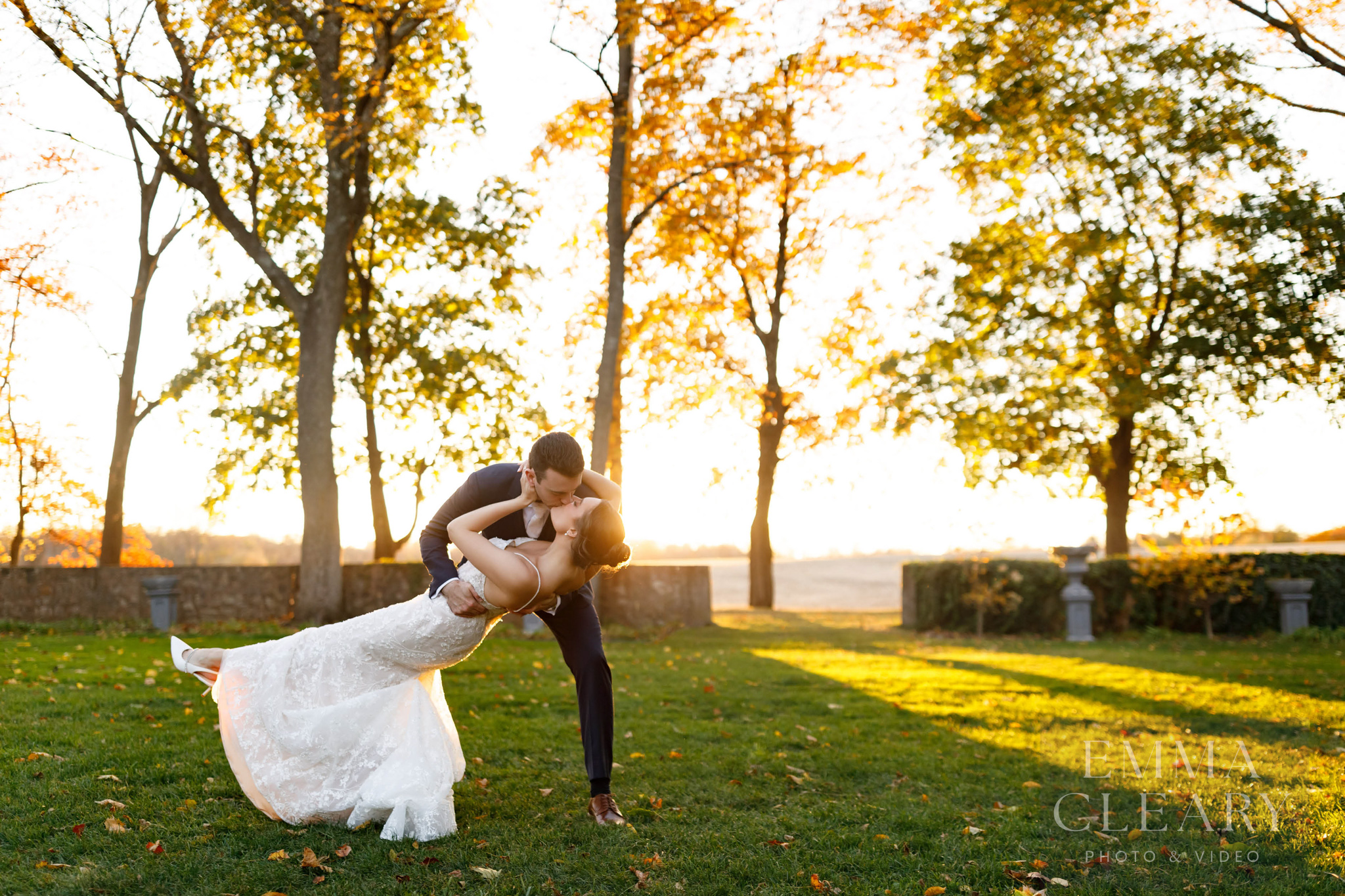 Sunset wedding kiss