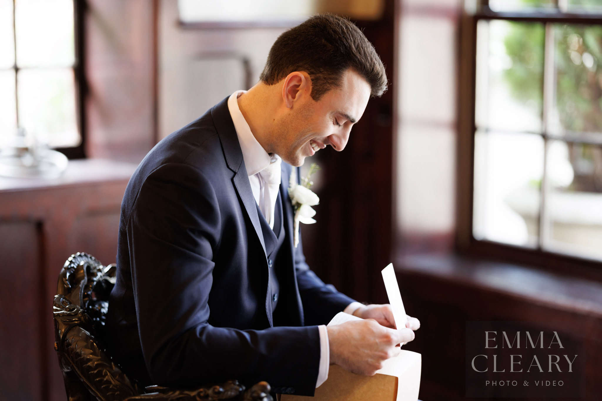 The groom reads the letter from the bride