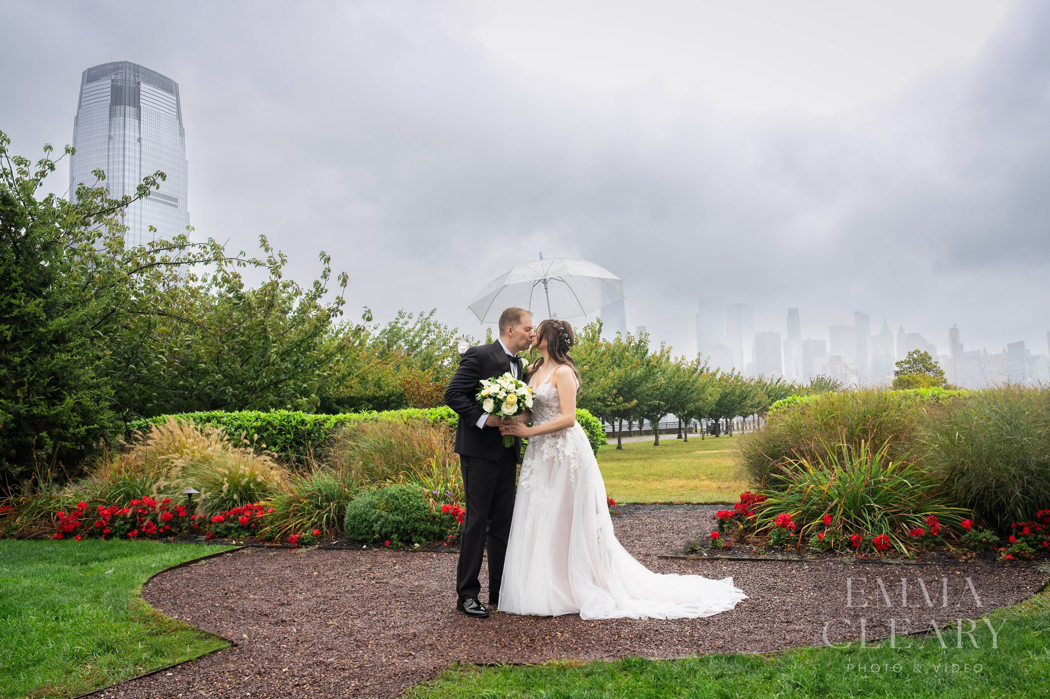 Wedding kiss in the rain
