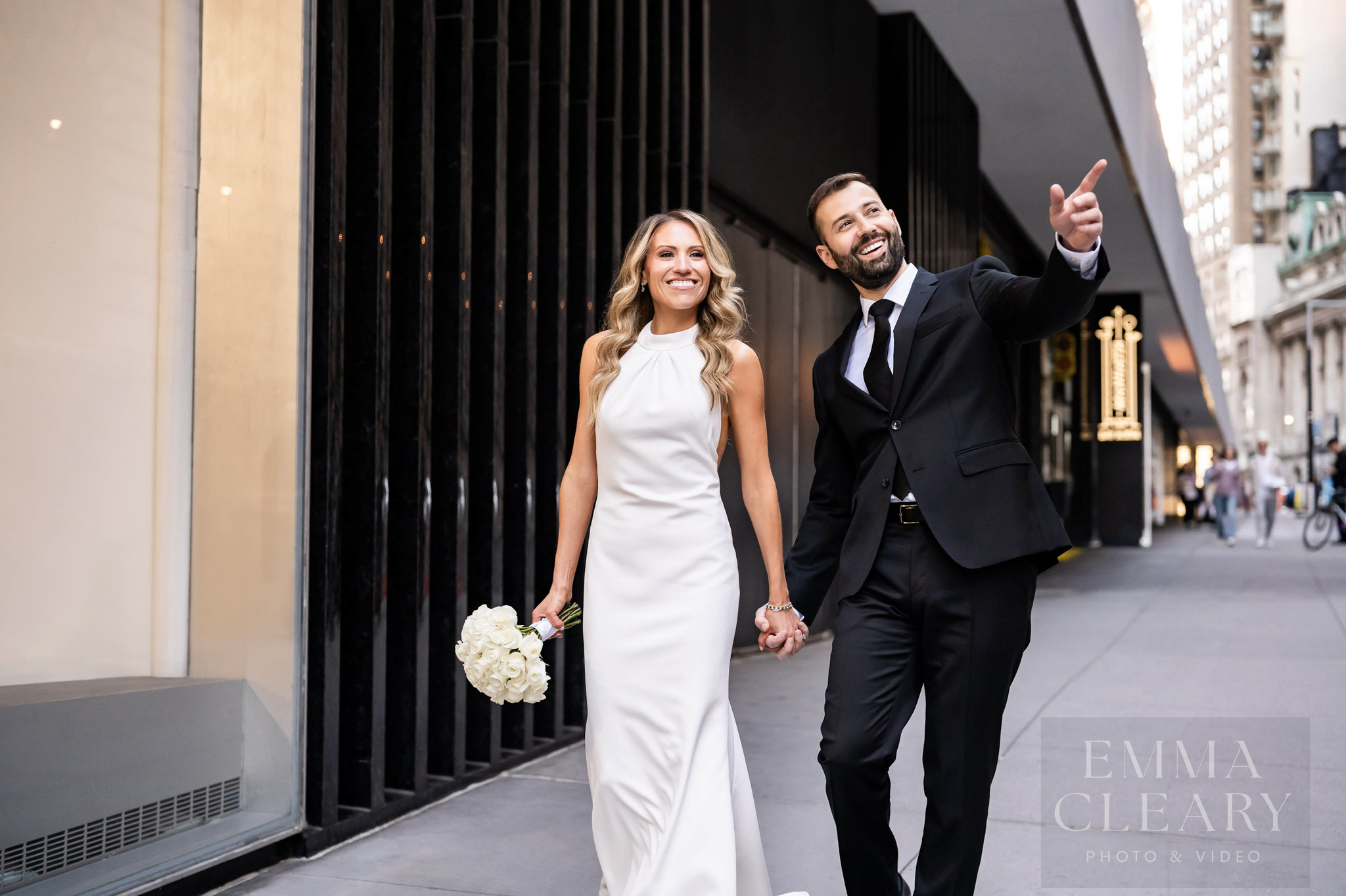 The bride and groom are walking