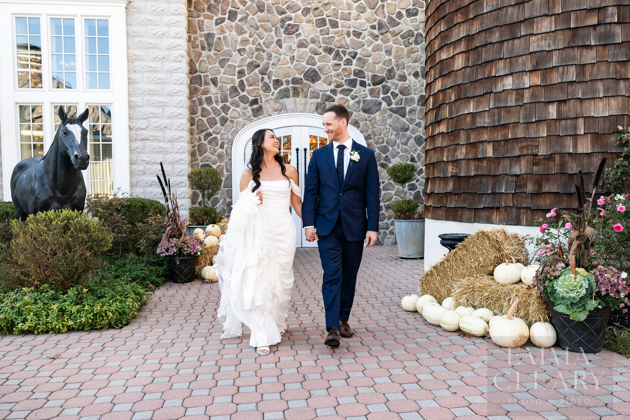 The bride and groom are walking