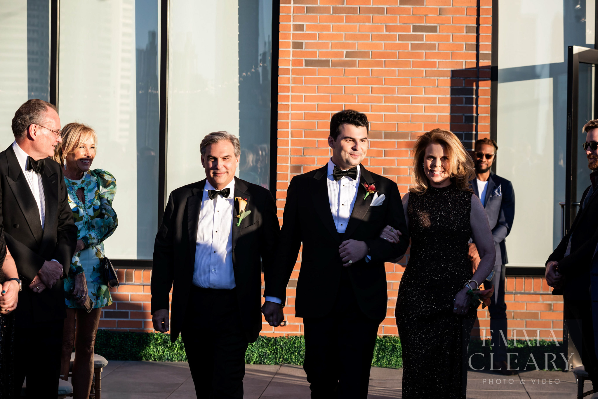 Photo of the groom with his parents