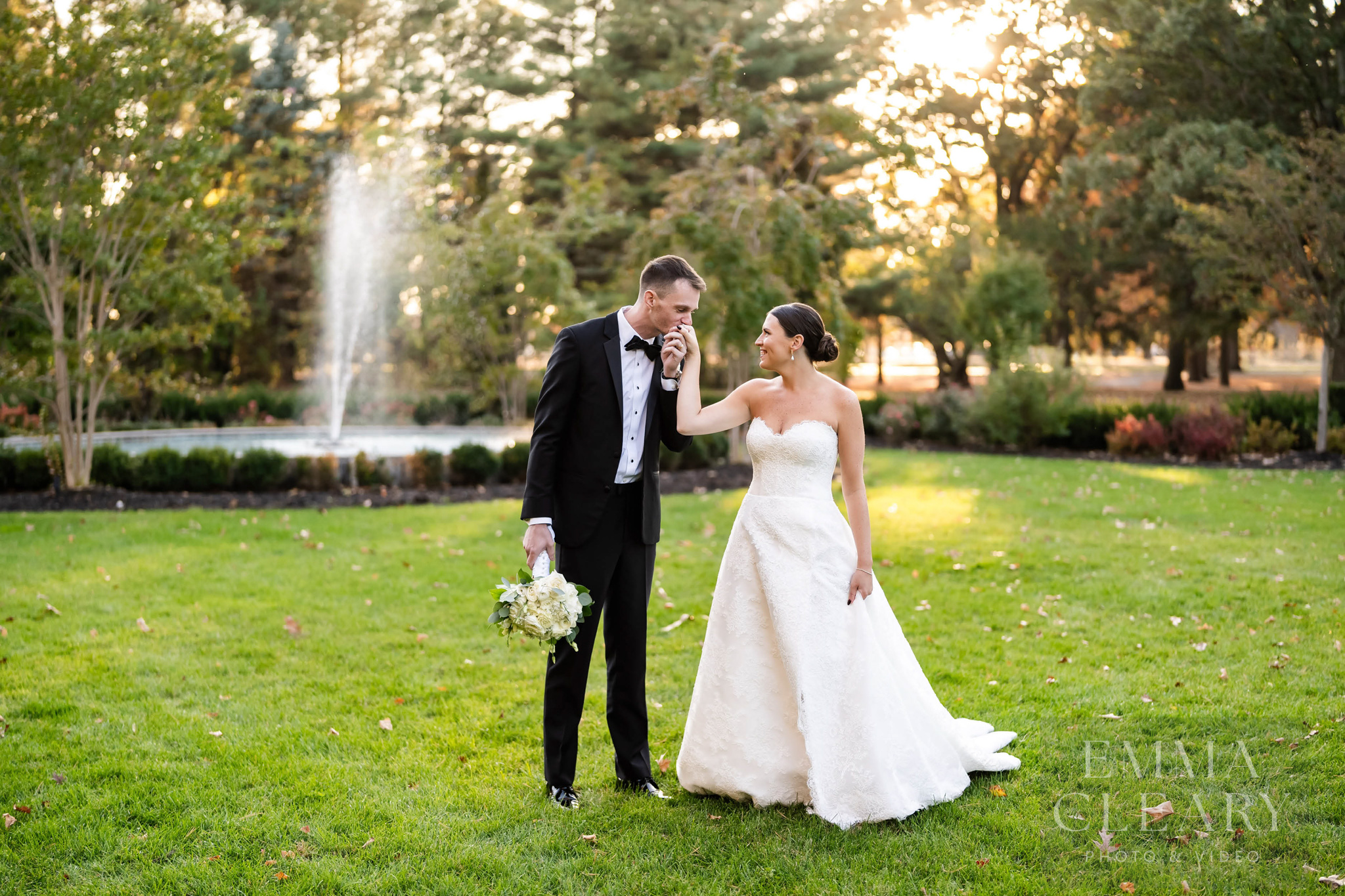 The groom kisses the bride's hand