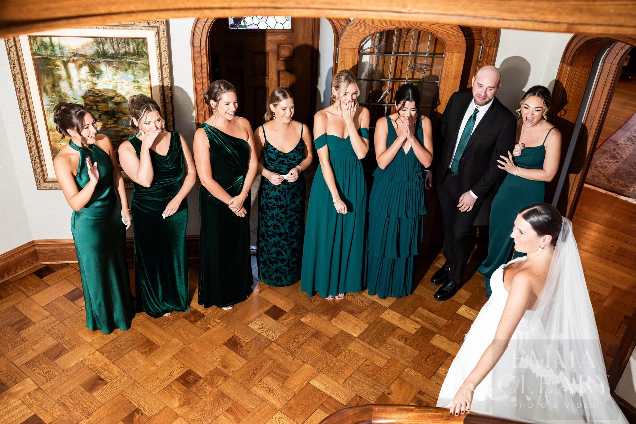 Bridesmades are surprised by the bride