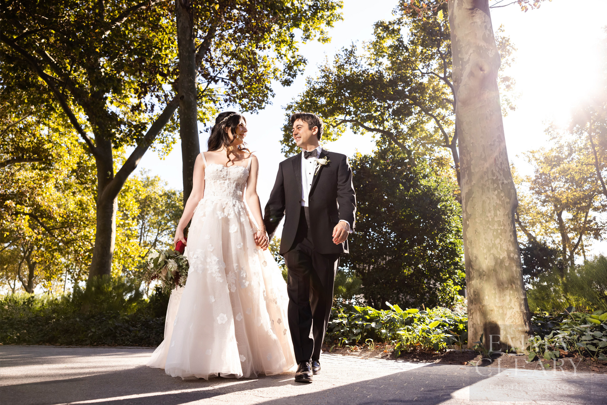 The bride and groom are walking