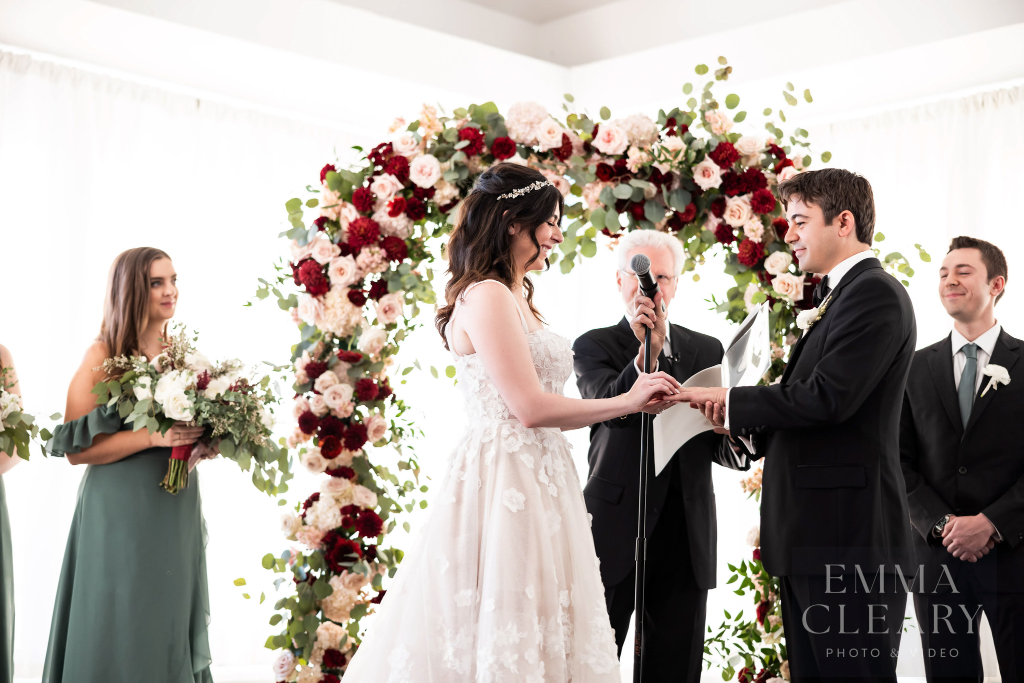 Bride and groom exchange rings