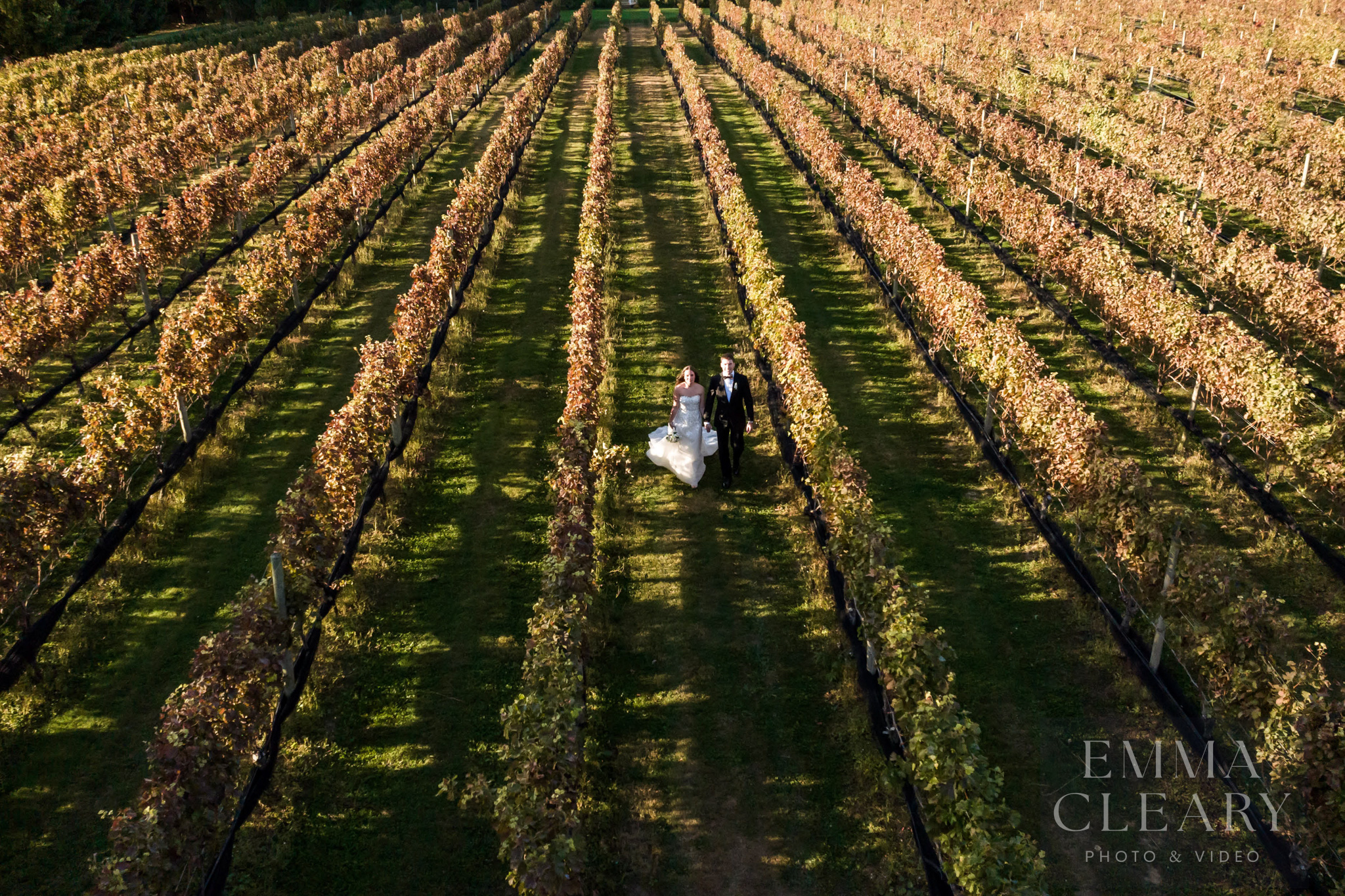 The bride and groom are walking